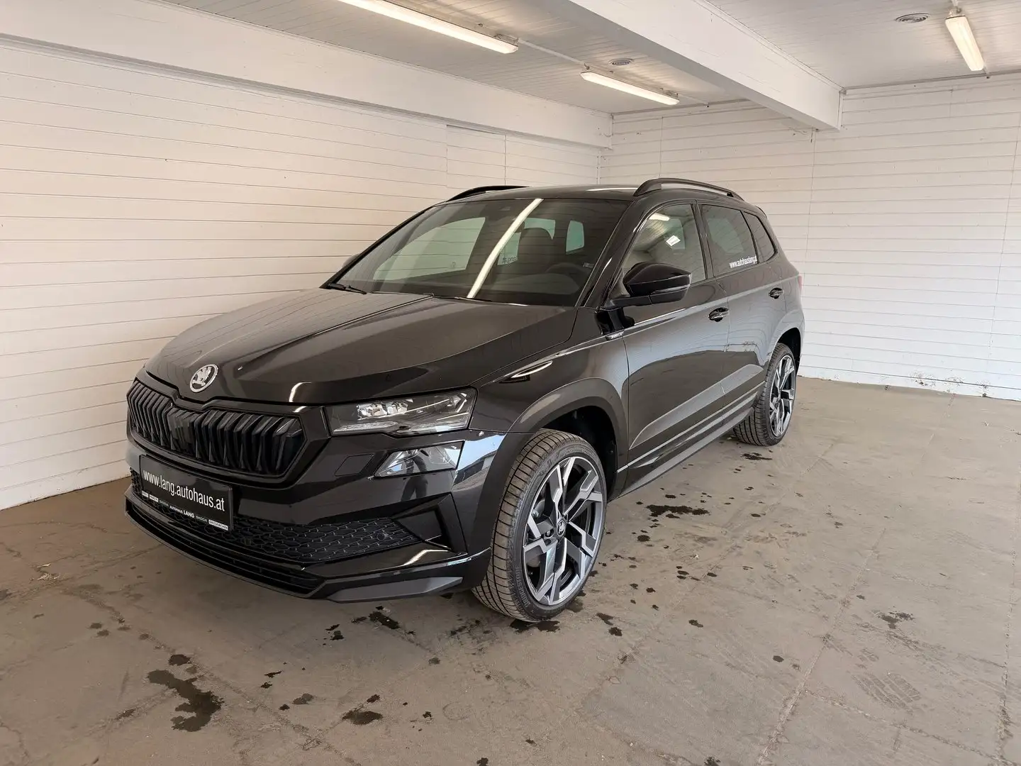 Skoda Karoq Sportline TSI DSG ACT Schwarz - 1