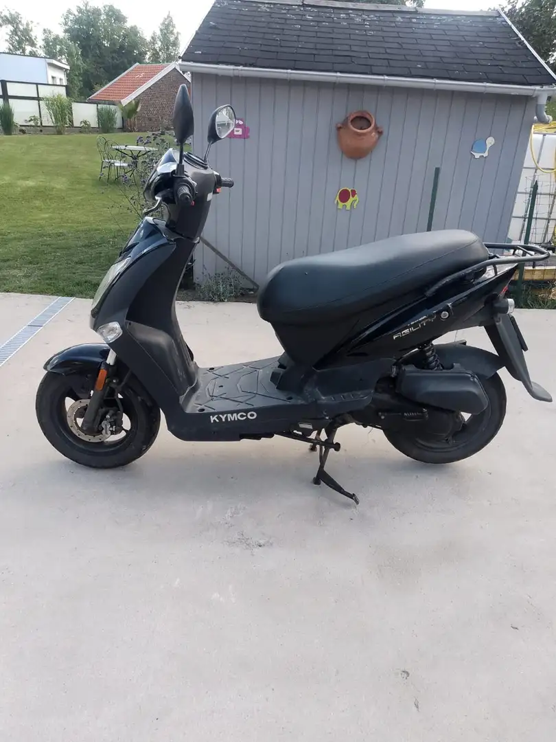 Kymco Чорний - 1