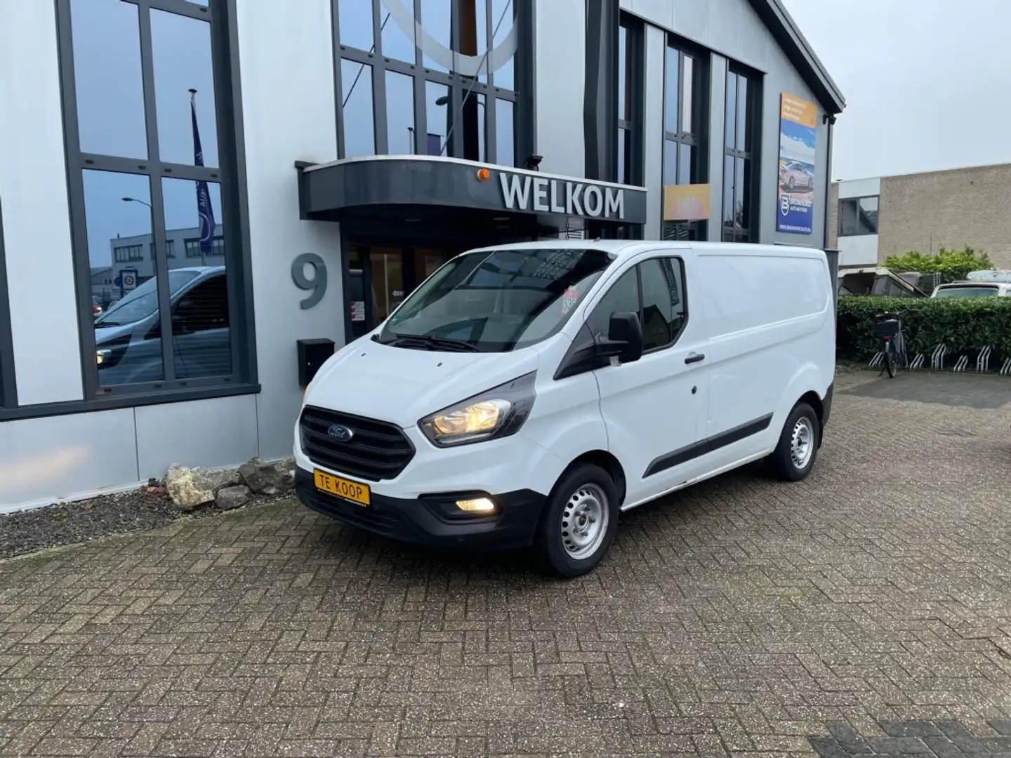 Ford Transit Custom 2.0 Tdci 108pk, airco, 3-pers, pdc, schuifdeur, bl Wit - 1