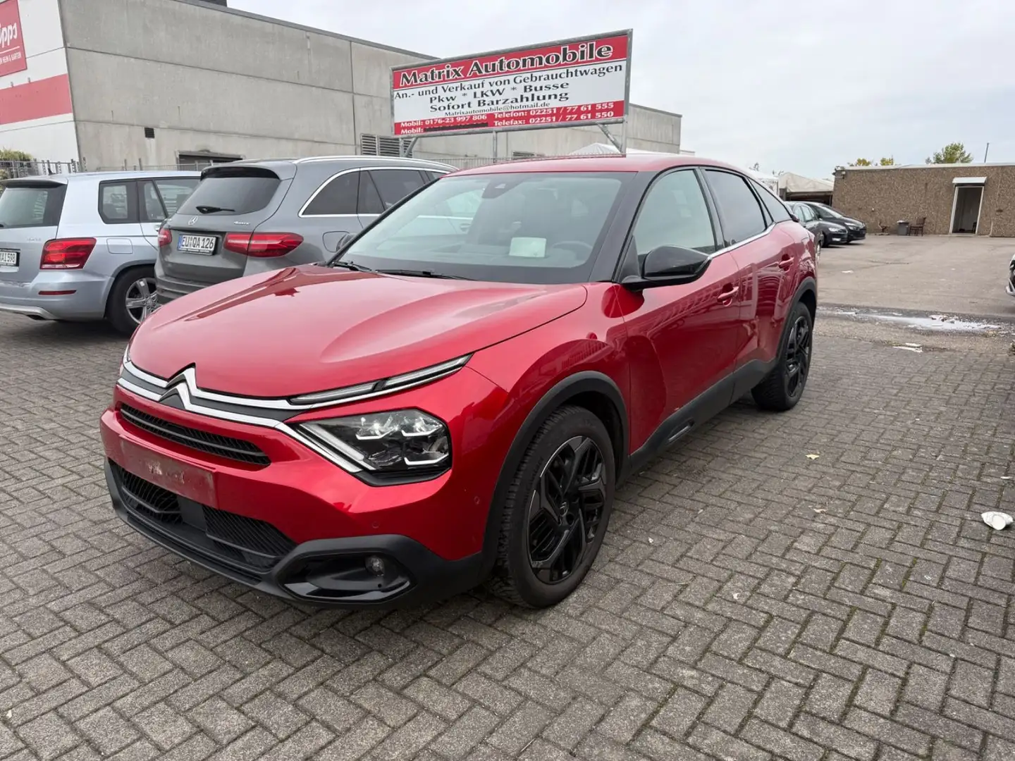 Citroen C4 Lim. Shine,Klima,navi,Kamera,E6 Rouge - 1