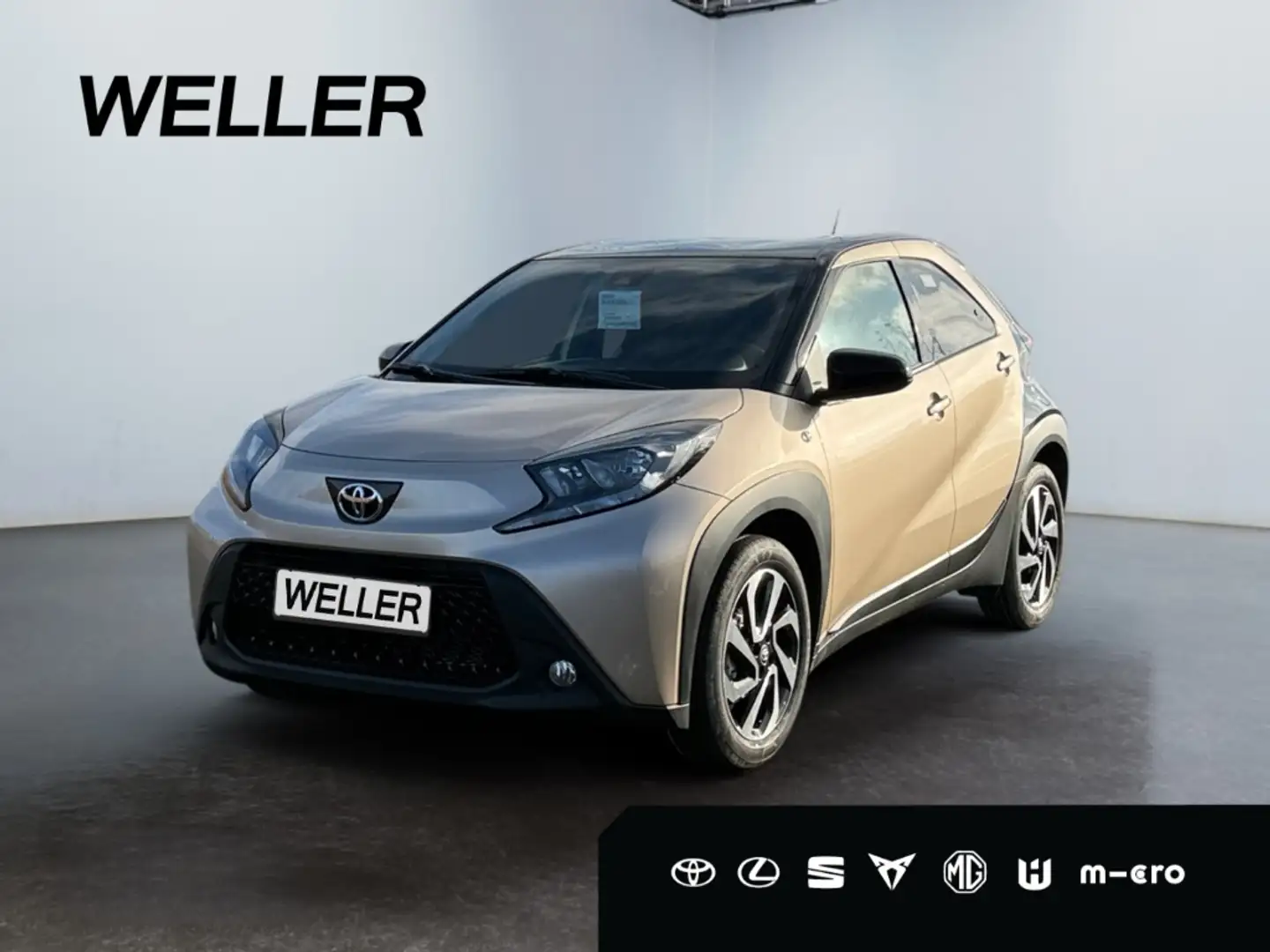 Toyota Aygo X 1,99% Finanz. Teamplayer *ACC*CarPlay*CAM*SHZ*Bi-T Beige - 1