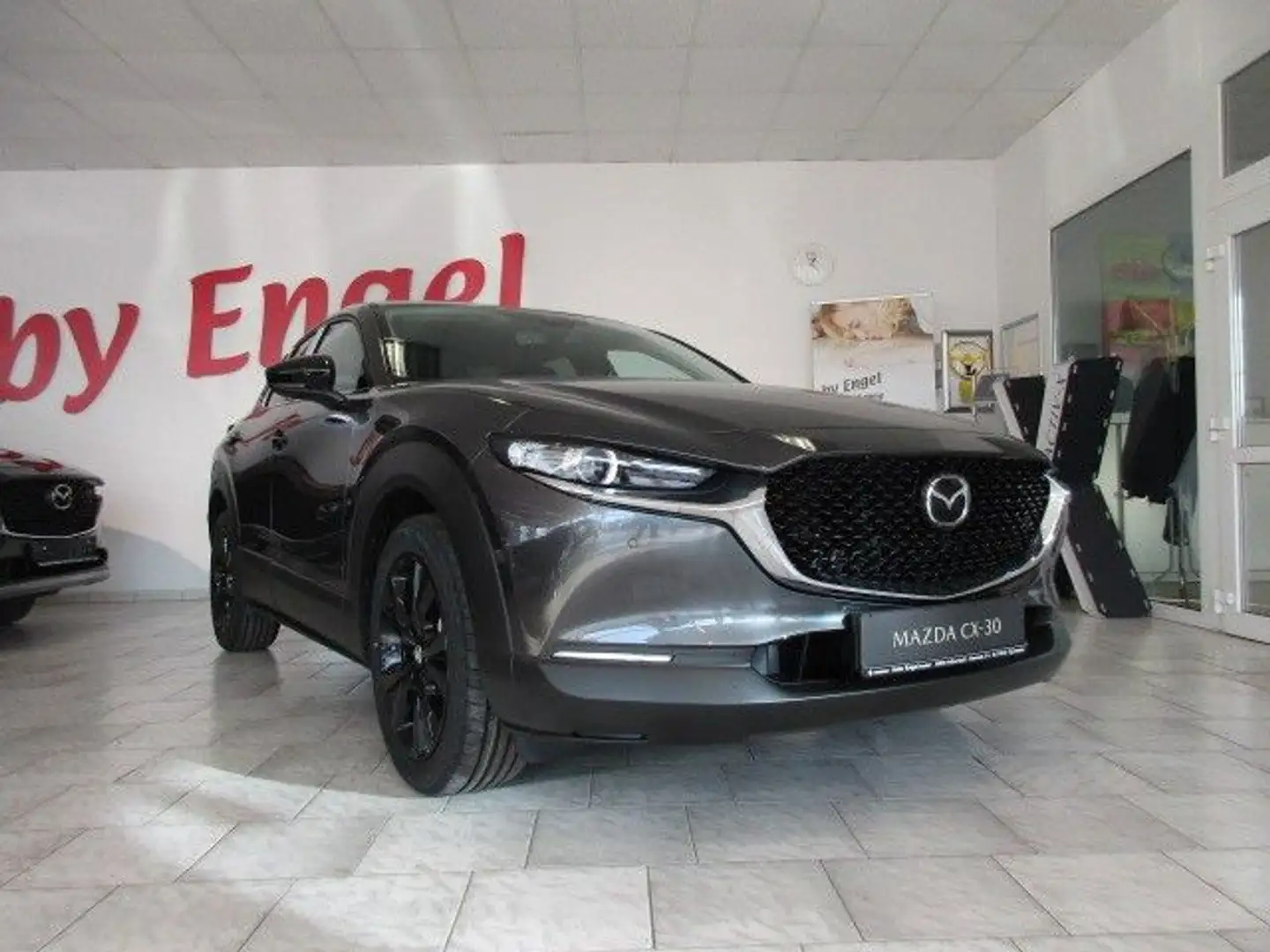 Mazda CX-30 e-SKYACTIV-G M-Hybrid 140 Homura AT Grijs - 1