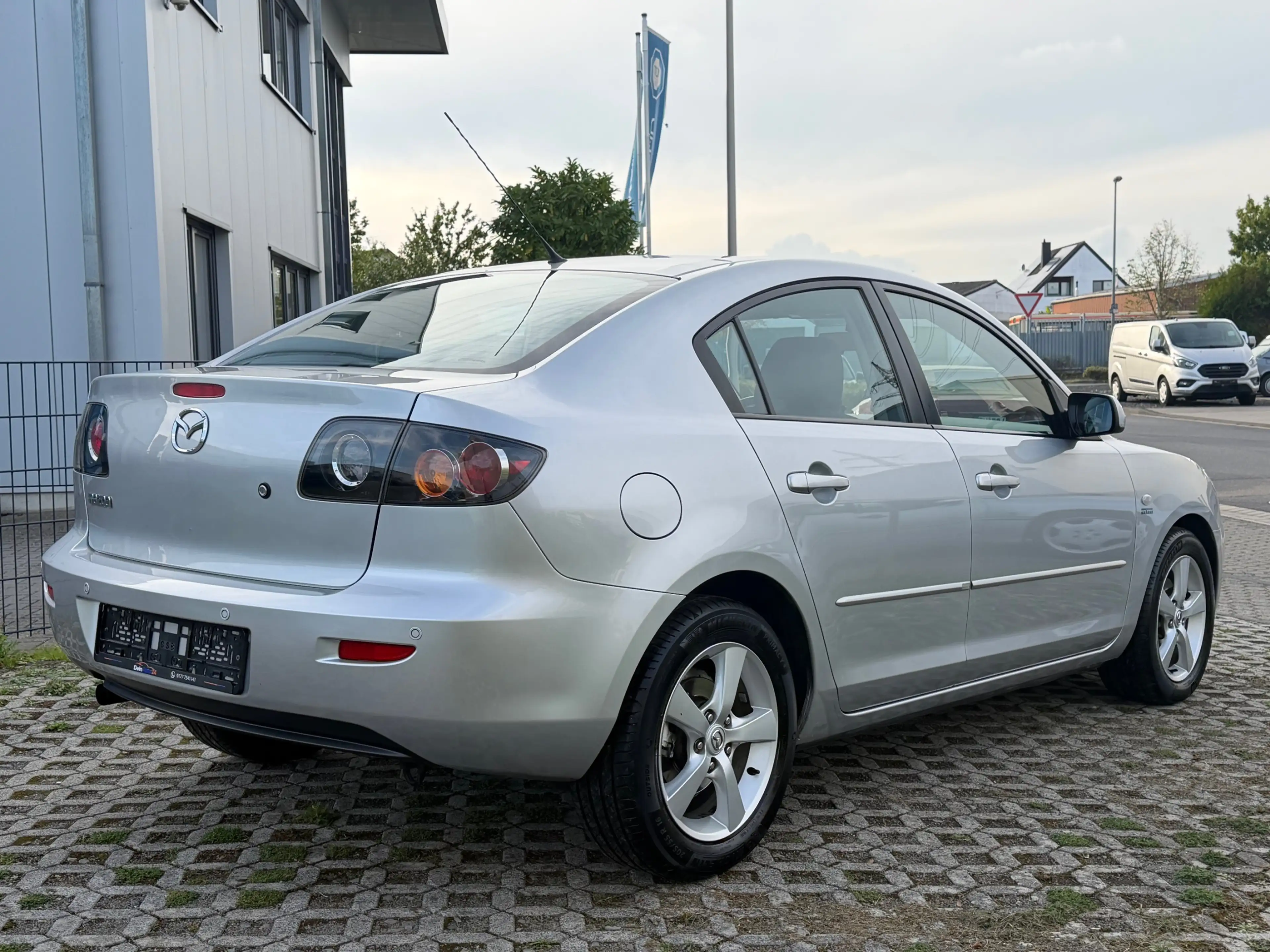 Mazda 3 1.6 Active Automatik TÜV neu 1.HD ZV Klima — photo 11