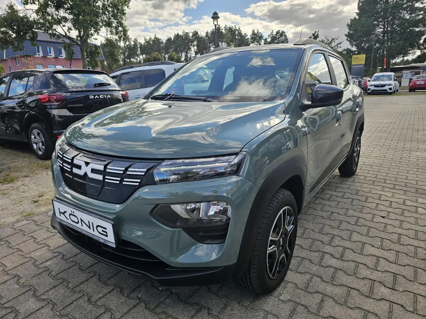 Dacia Spring Essential, Navi, Kamera, Klima Grün - 1