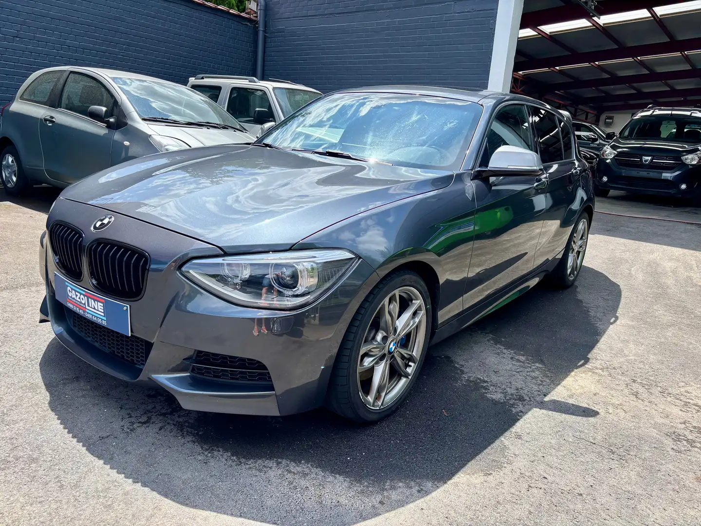 BMW 135 M135iXAS TO avec historique et car-pass Grijs - 2