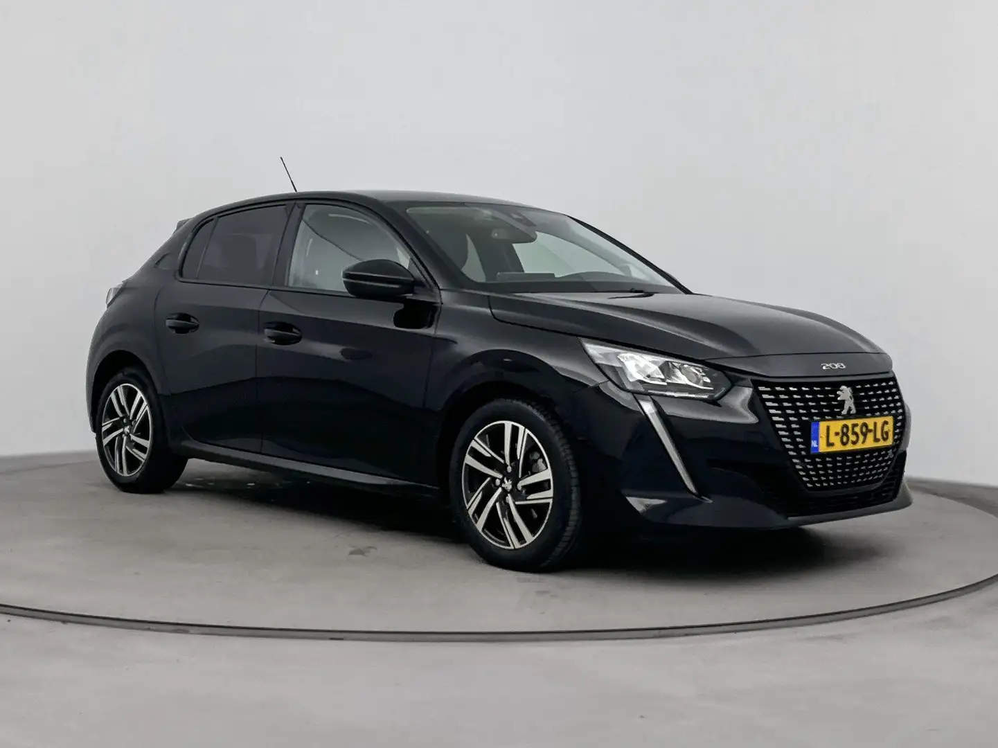 Peugeot 208 1.2 PureTech Allure Pack | Climate control | Navig Zwart - 2