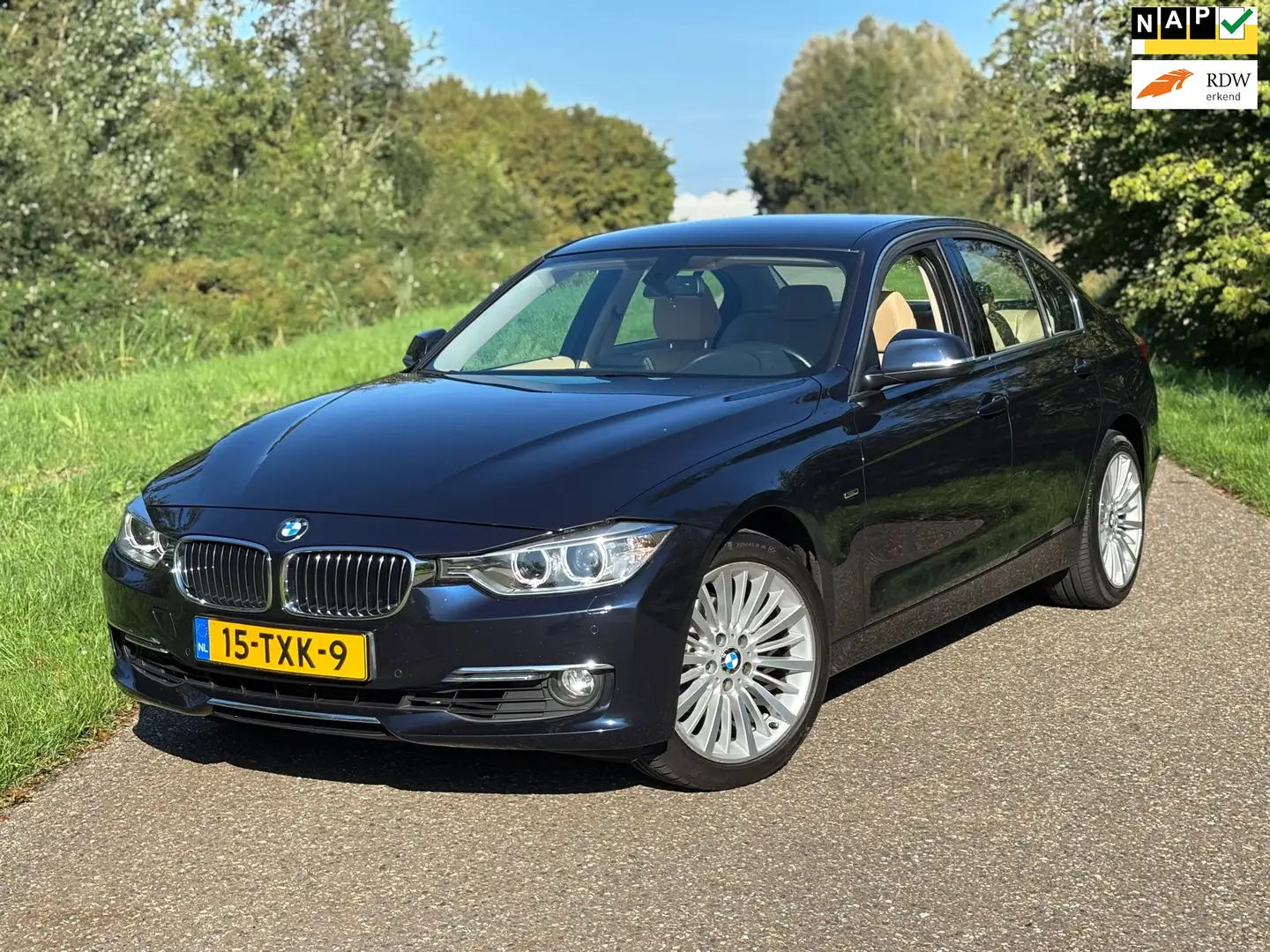 BMW 320 3-serie 320i High Exec Aut/Leder/Xenon/Navi/Pdc Blauw - 1