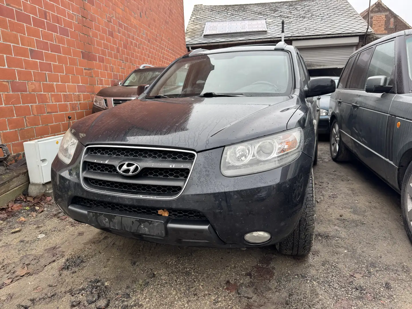 Hyundai SANTA FE 2.2 CRDi 4WD Comfort rouke impecable Zwart - 1