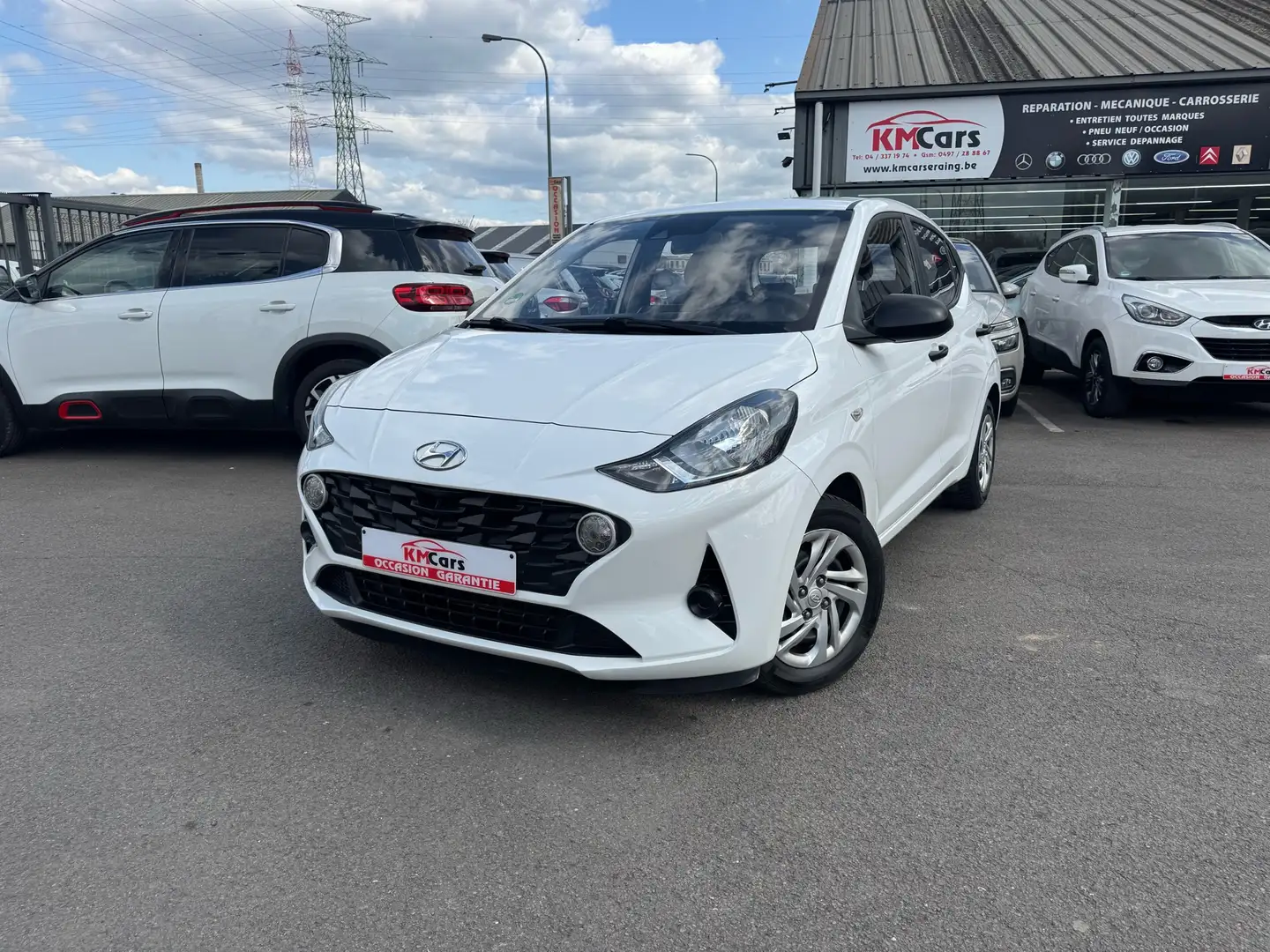 Hyundai i10 1.0i ESSENCE / 1'ier PROPRIETAIRE / CLIMATISATION Blanc - 1