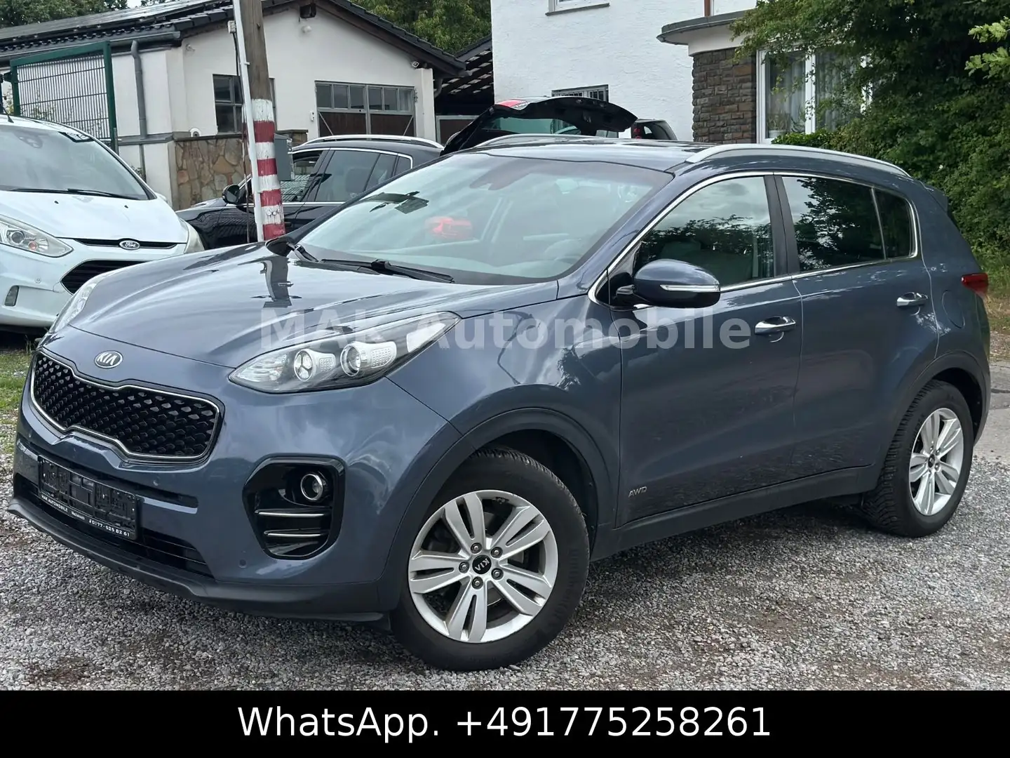 Kia Sportage Vision 4WD Automatik,Leder,Navi,Kam,EU6 Blau - 1