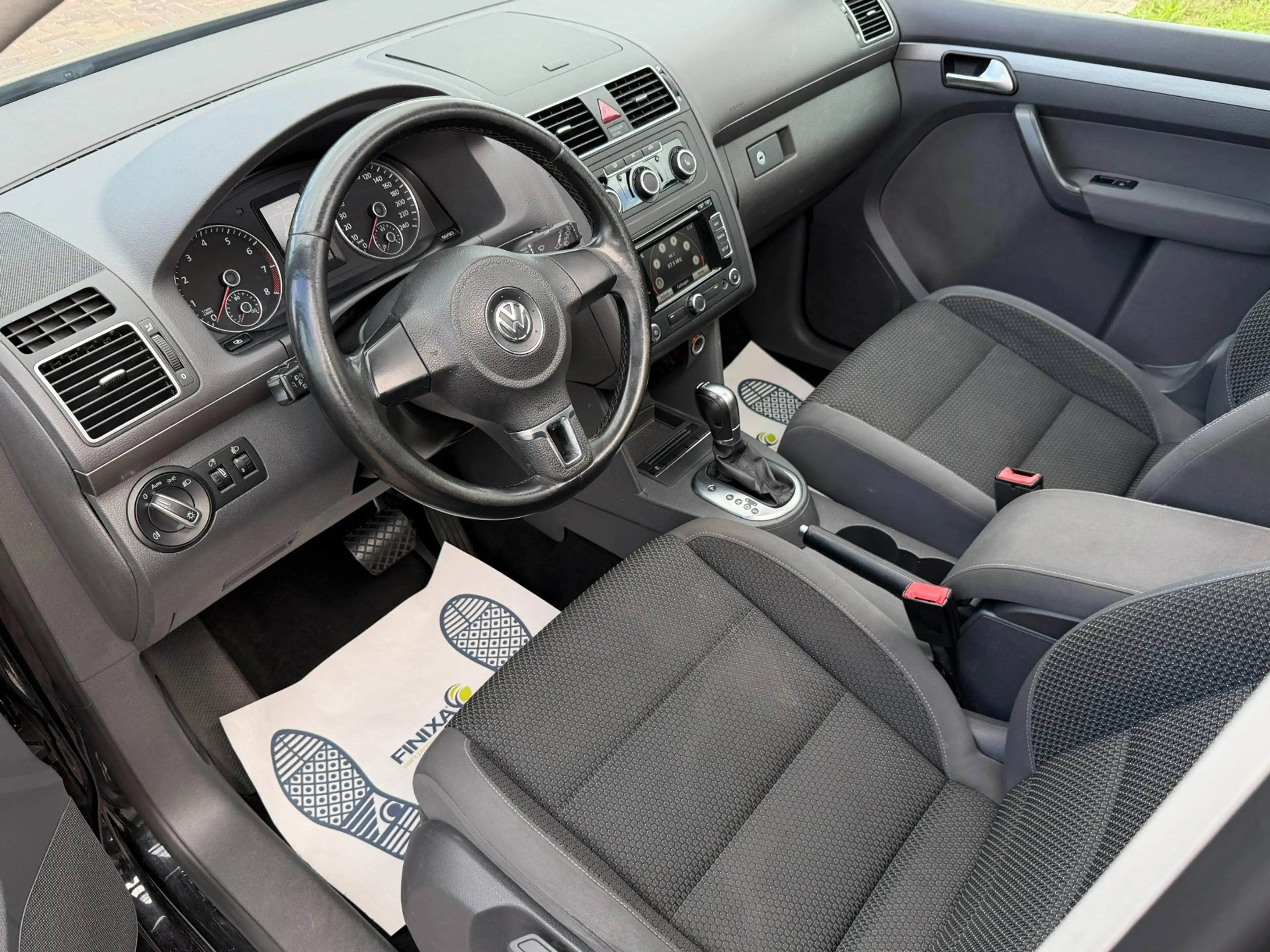 Volkswagen Touran 1.4 TSI Highline DSG l PANO l TREKHAAK — photo 4