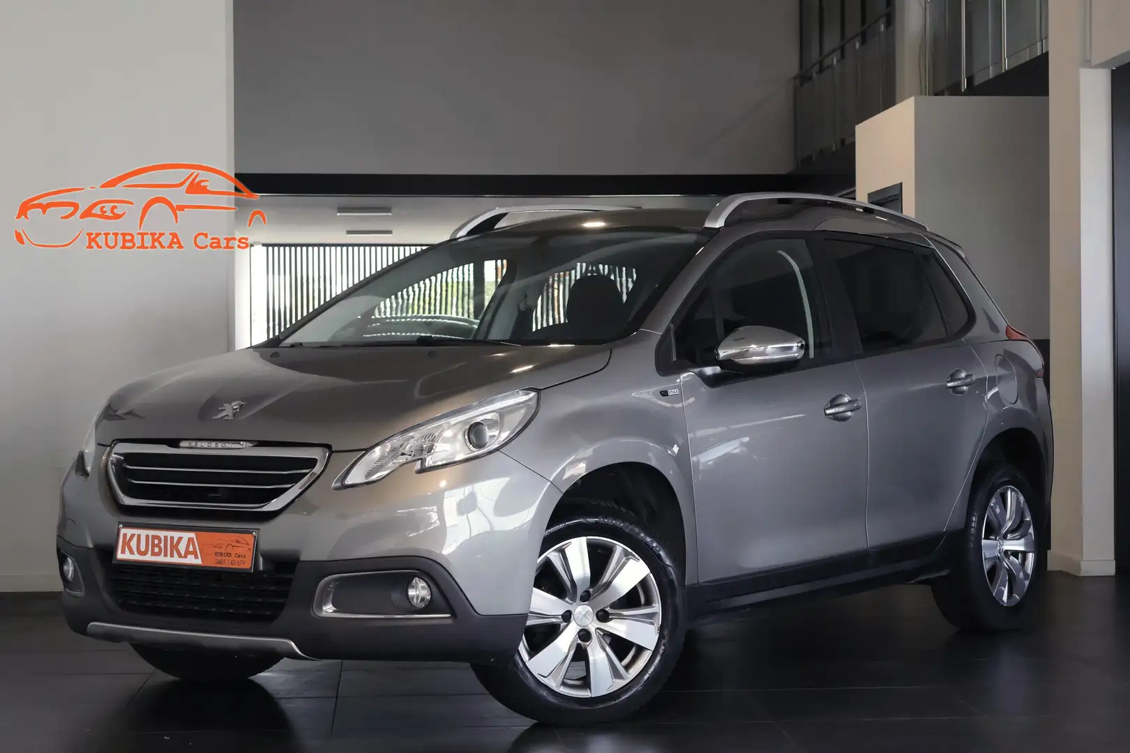 Peugeot 2008 1.2i PureTech Style Navi CruiseC Airco Garantie* Grijs - 1