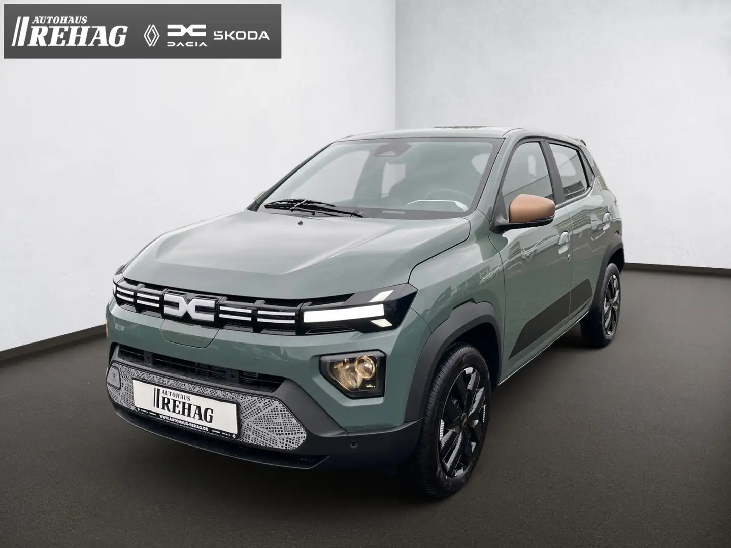 Dacia Spring Extreme ELECTRIC 65 *KLIMA*NAVI* Grün - 1