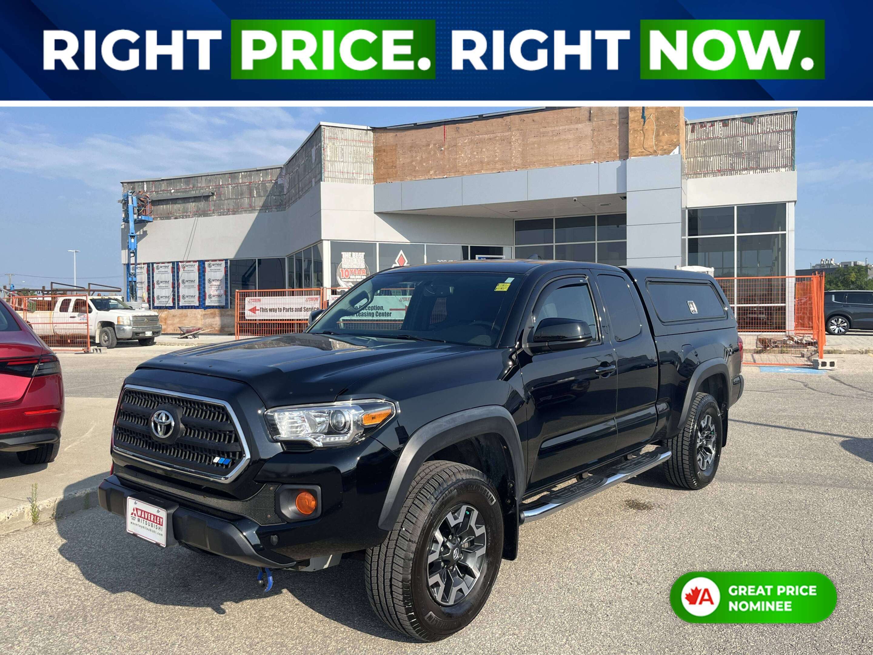 Black 2016 Toyota Tacoma Pickup Truck Four-Wheel Drive 6-Speed Manual