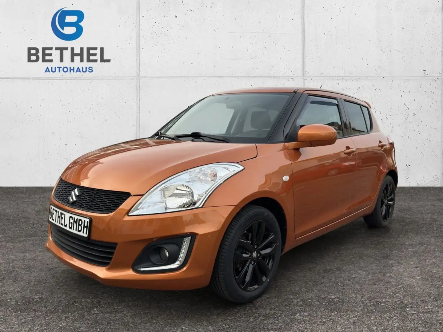 Suzuki Swift 1.2 Comfort Sportpaket Klima Einparkhilfe Orange - 1