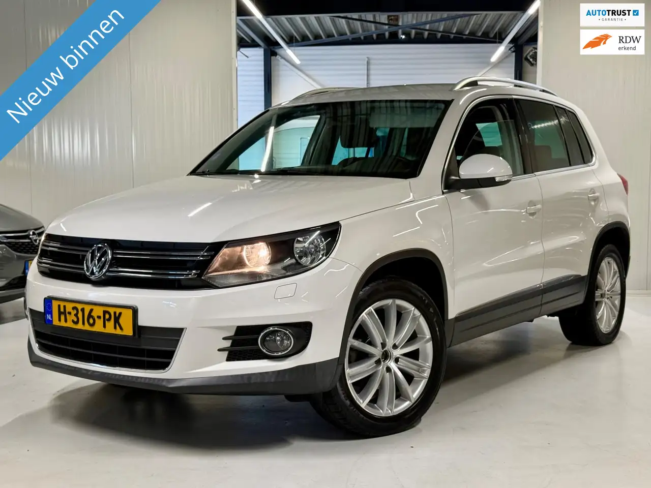 Volkswagen Tiguan 1.4 TSI 150PK Sport&Style Carplay|Trekhaak! — photo 1 of 29