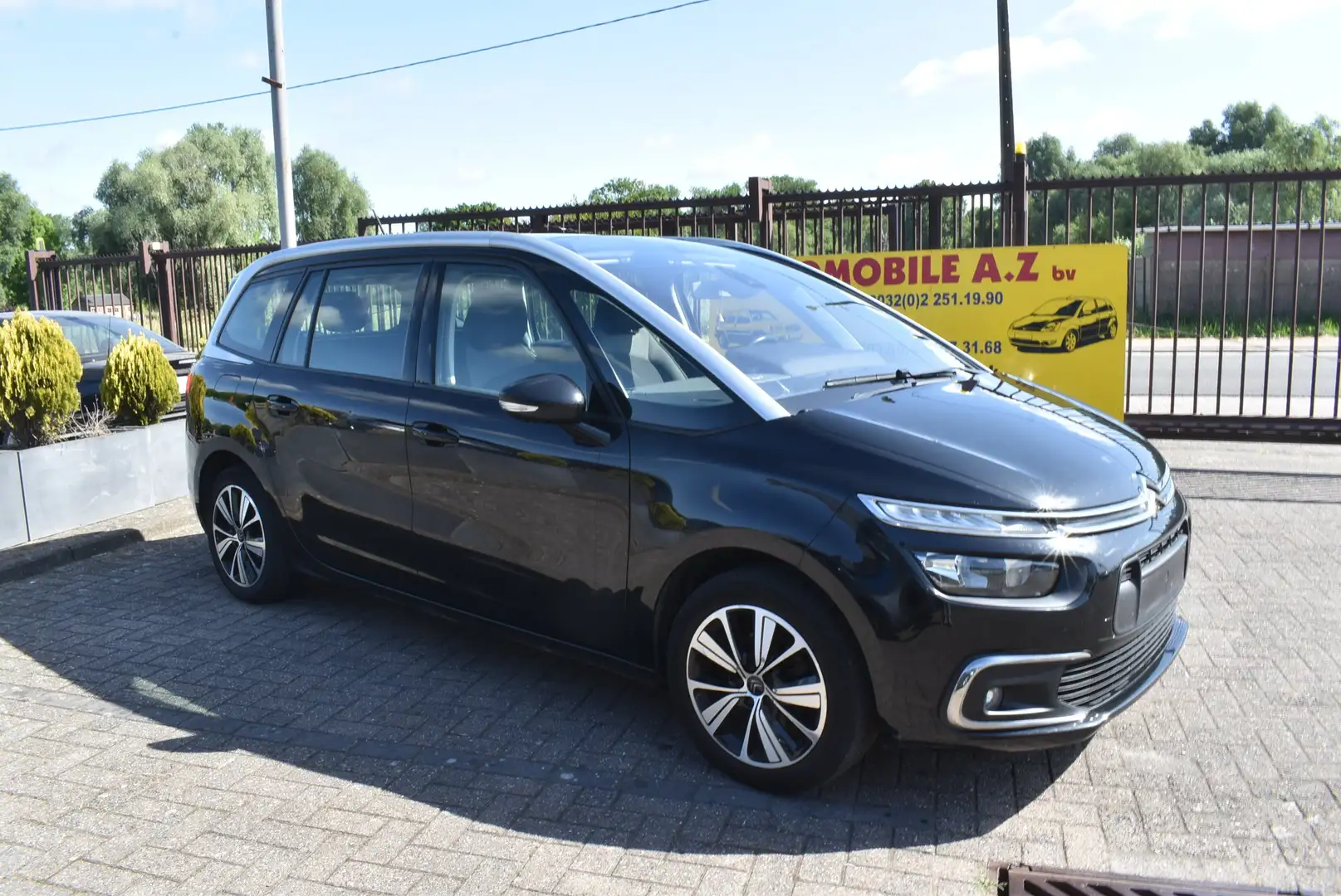 Citroen Grand C4 Picasso 1.6 BlueHDi Shine 7PL / Airco / GPS Zwart - 1