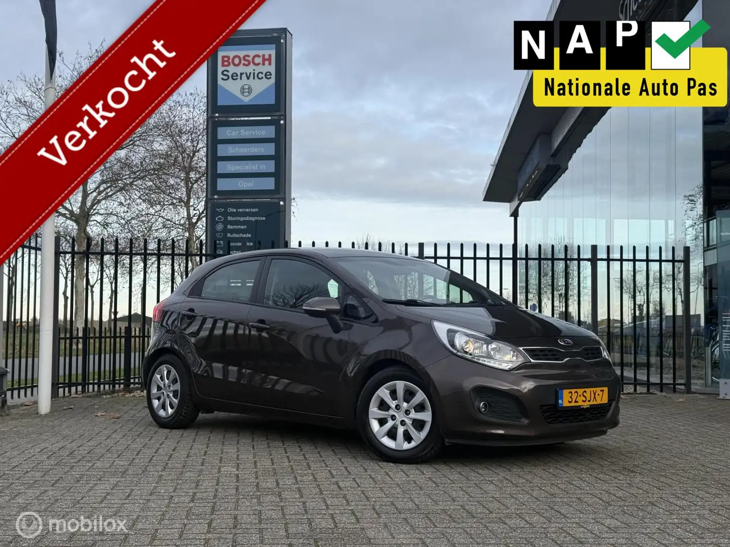 Kia Rio 1.2 CVVT Super | Keyless, incl zomerset, 1e eigena Bruin - 1