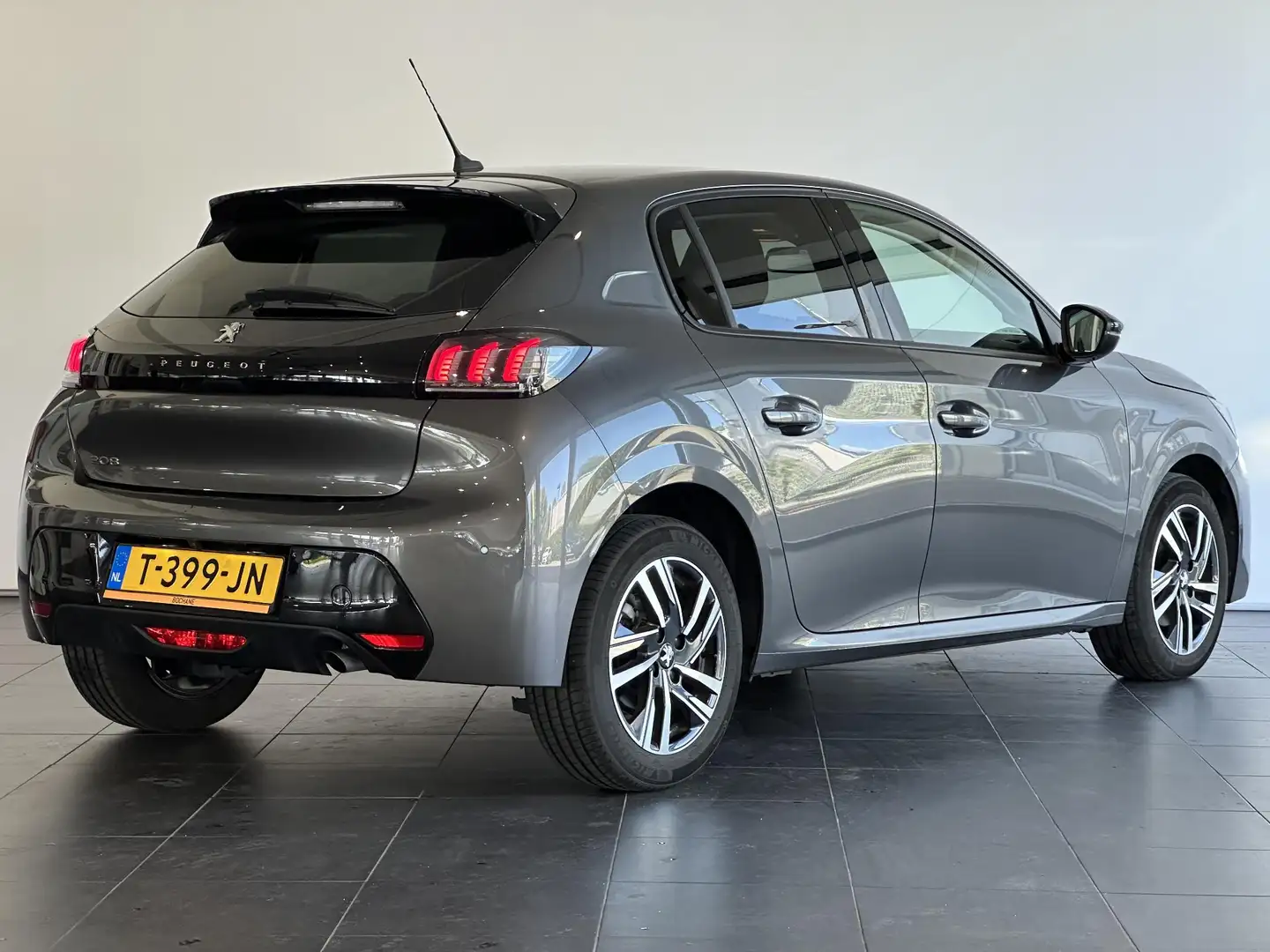 Peugeot 208 1.2 PureTech Allure Pack APPLE CARPLAY | ACHTERUIT Gris - 2