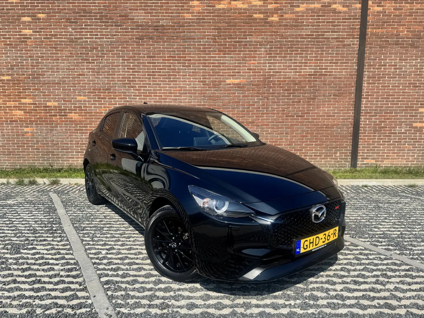 Mazda 2 1.5 e-SkyActiv-G 90PK Homura Climate control | Cru Zwart - 2