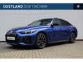 BMW i4 M60 / Trekhaak / Sportstoelen / M Adaptief onderst Blauw - thumbnail 1