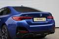 BMW i4 M60 / Trekhaak / Sportstoelen / M Adaptief onderst Blauw - thumbnail 28