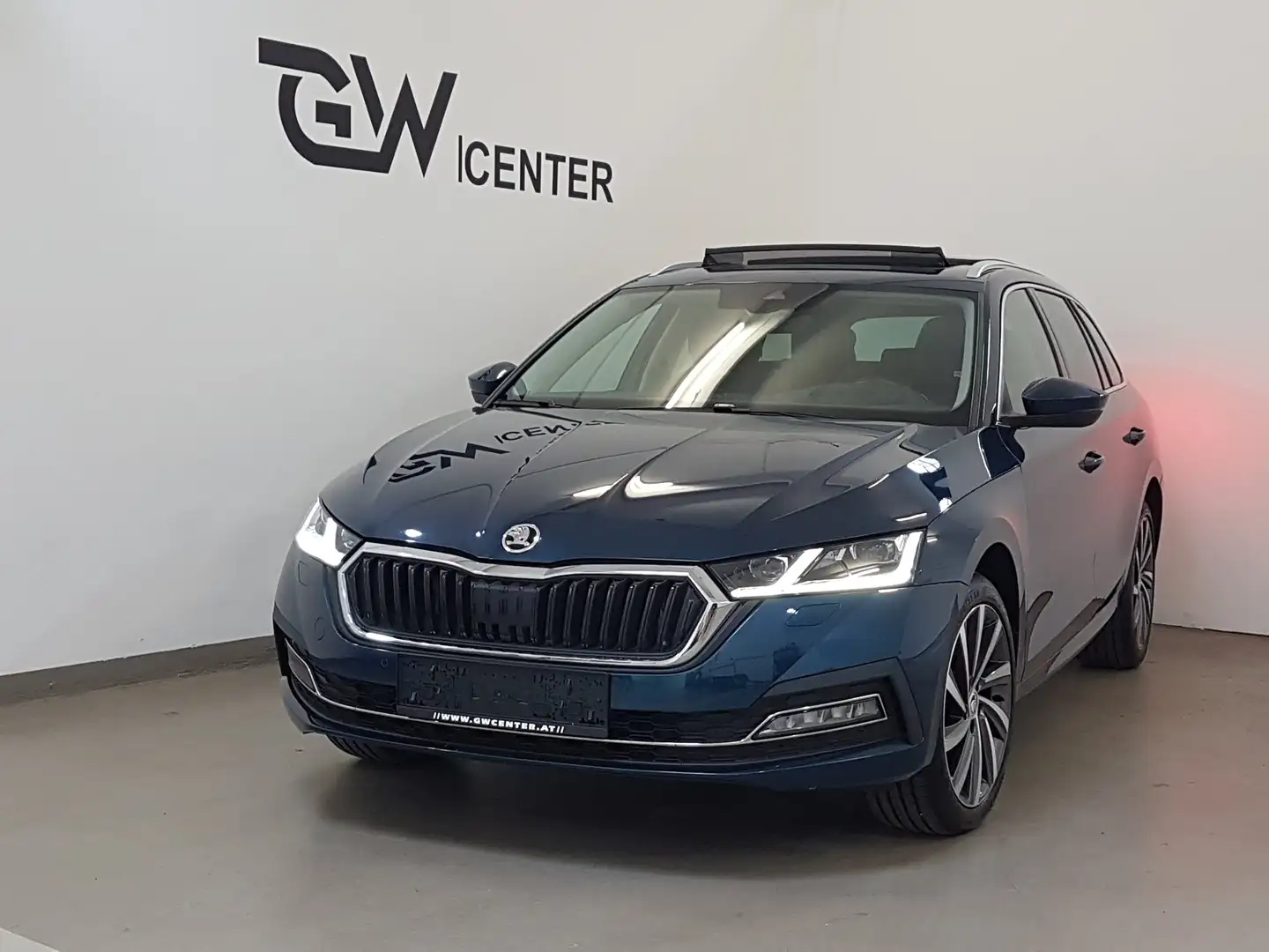 Skoda Octavia Combi 2,0 TDI DSG Style Matrix AHK Sthzg Blau - 1