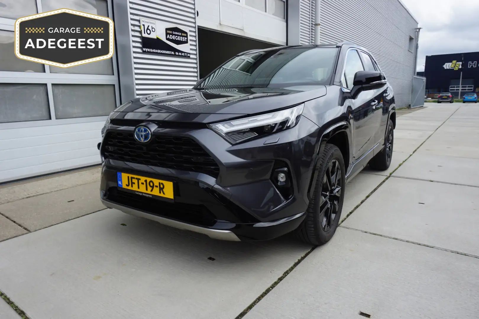 Toyota RAV 4 2.5 Hybrid AWD Style Bi-Tone |Navi|Carplay|PDC V+A Grijs - 1