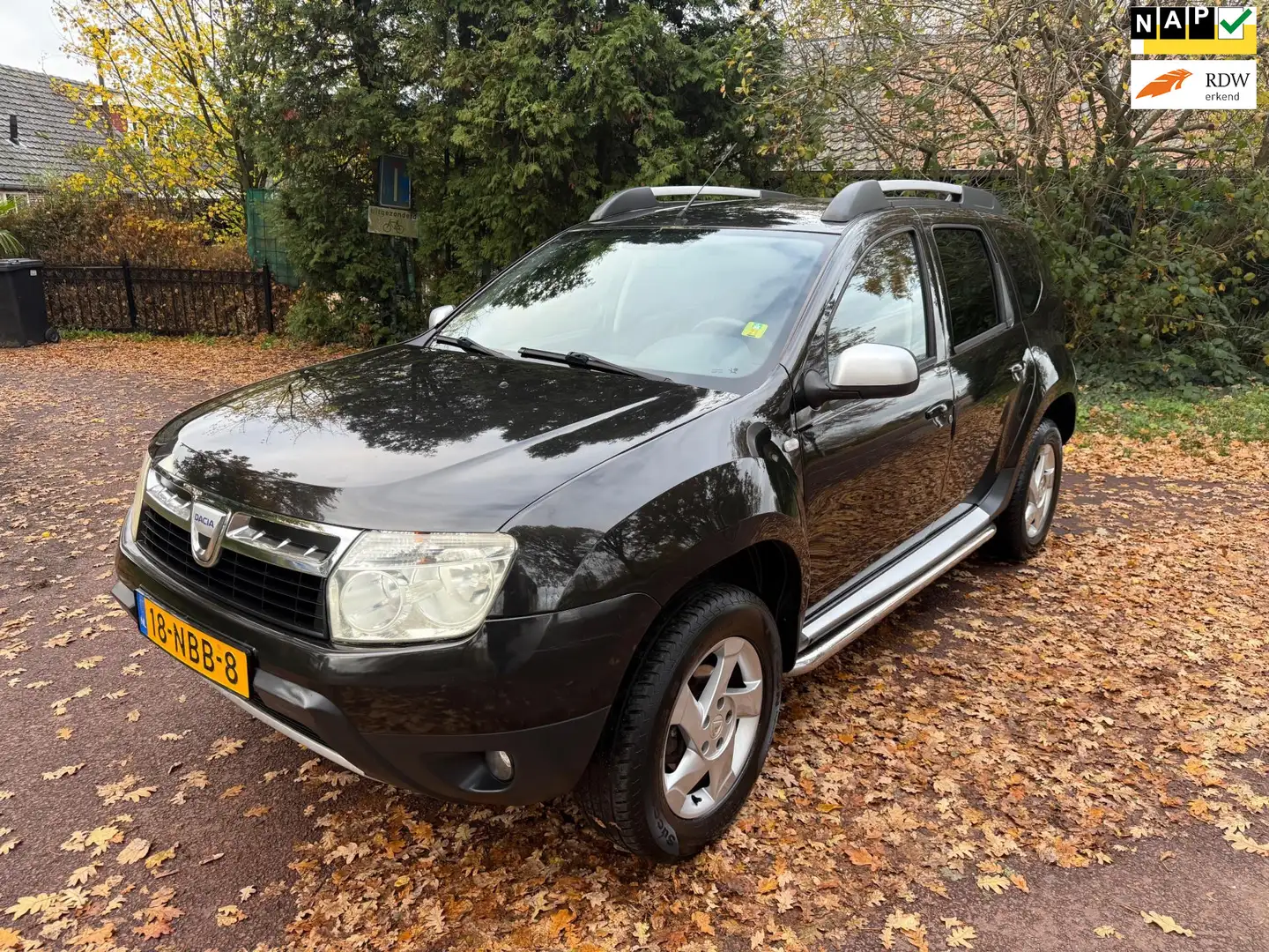 Dacia Duster 1.6 Lauréate 2wd / Airco / Aux / NAP / Apk / Trekh Noir - 1