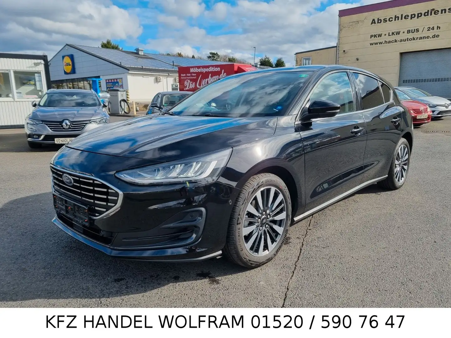 Ford Focus Lim. Titanium X NUR 18.200KM ECOBOOST/HYBR Schwarz - 1