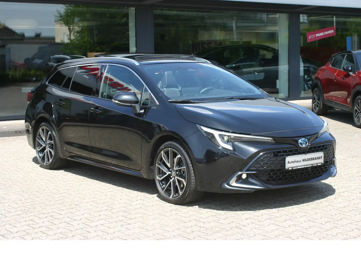 Toyota Corolla Hybrid Lounge Matrix|Pano|AHK|HUD|Leder Zwart - 1