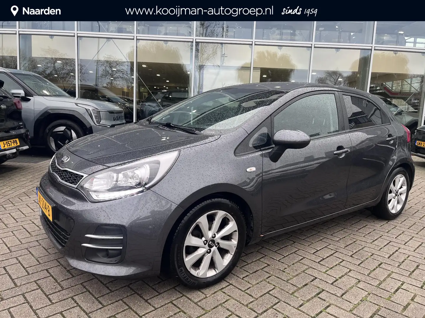 Kia Rio 1.2 CVVT DynamicLine Navigatie|Camera|Lmv|Cruise c Grijs - 1