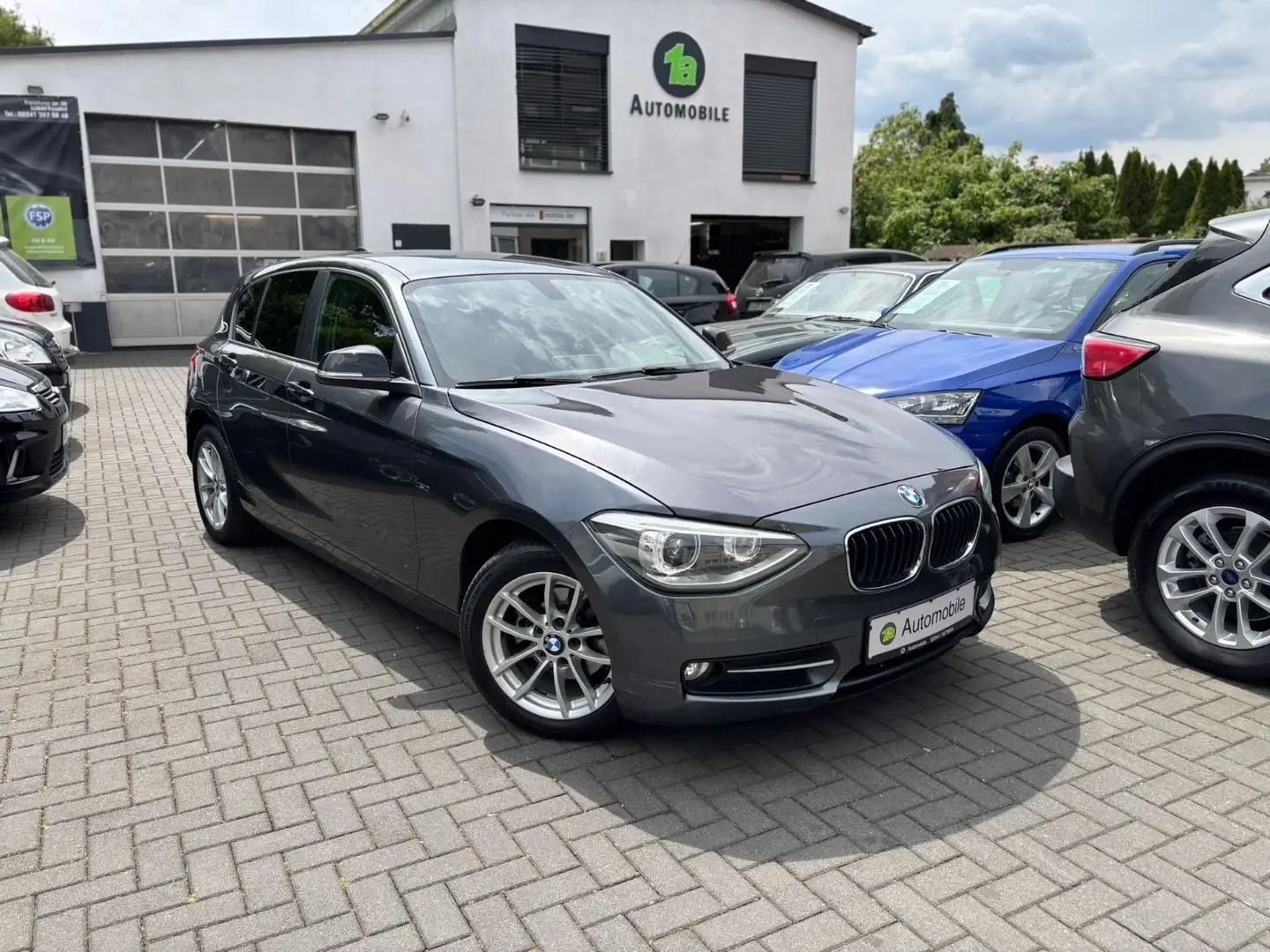 BMW 116 i Sport*KLIMAA.*SHZ*PDC*LED*4S-REIFEN Grau - 1