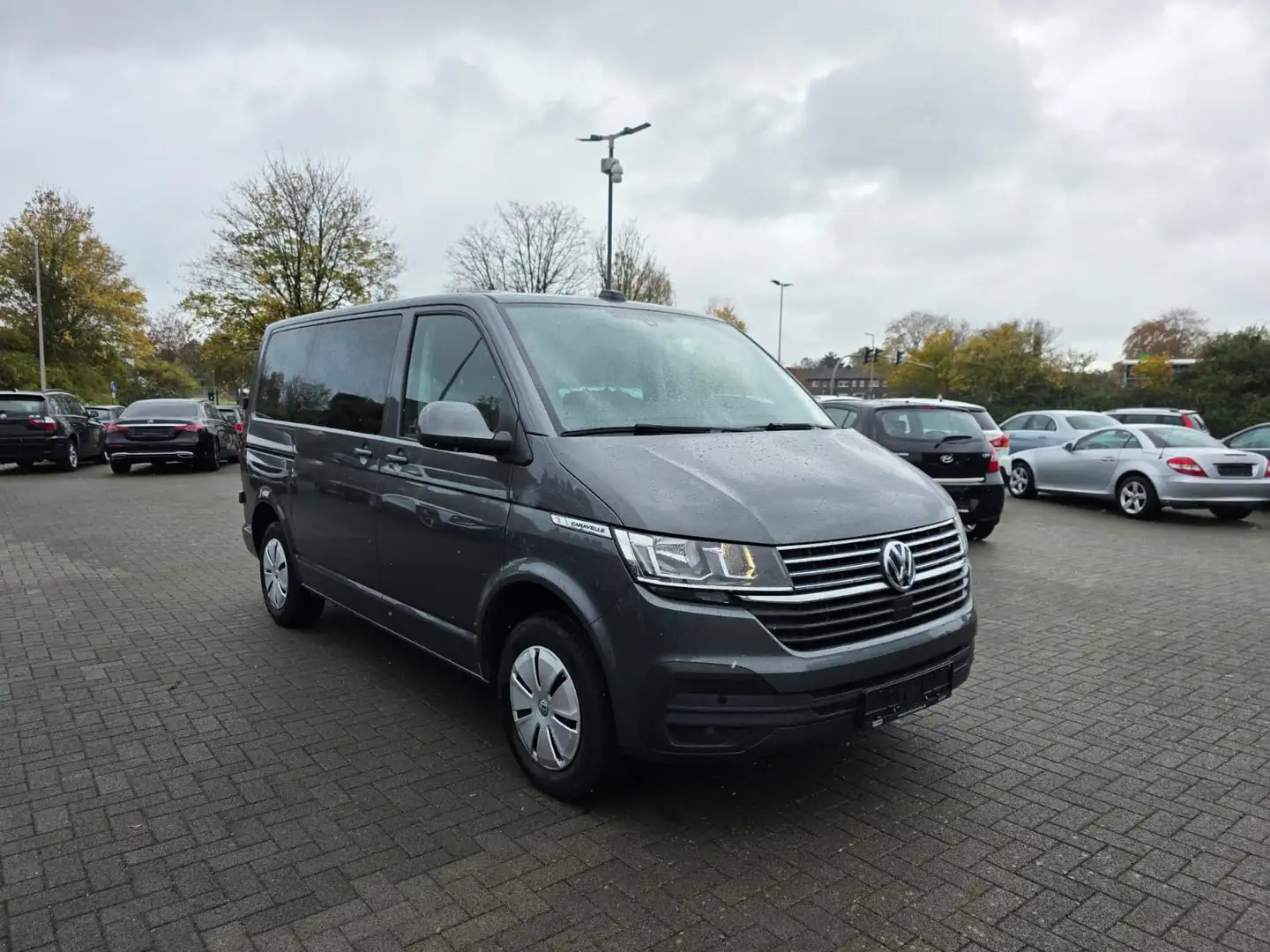 Volkswagen T6 Caravelle Comfortline*9 Sitze*Carplay*K-Leder Gris - 1