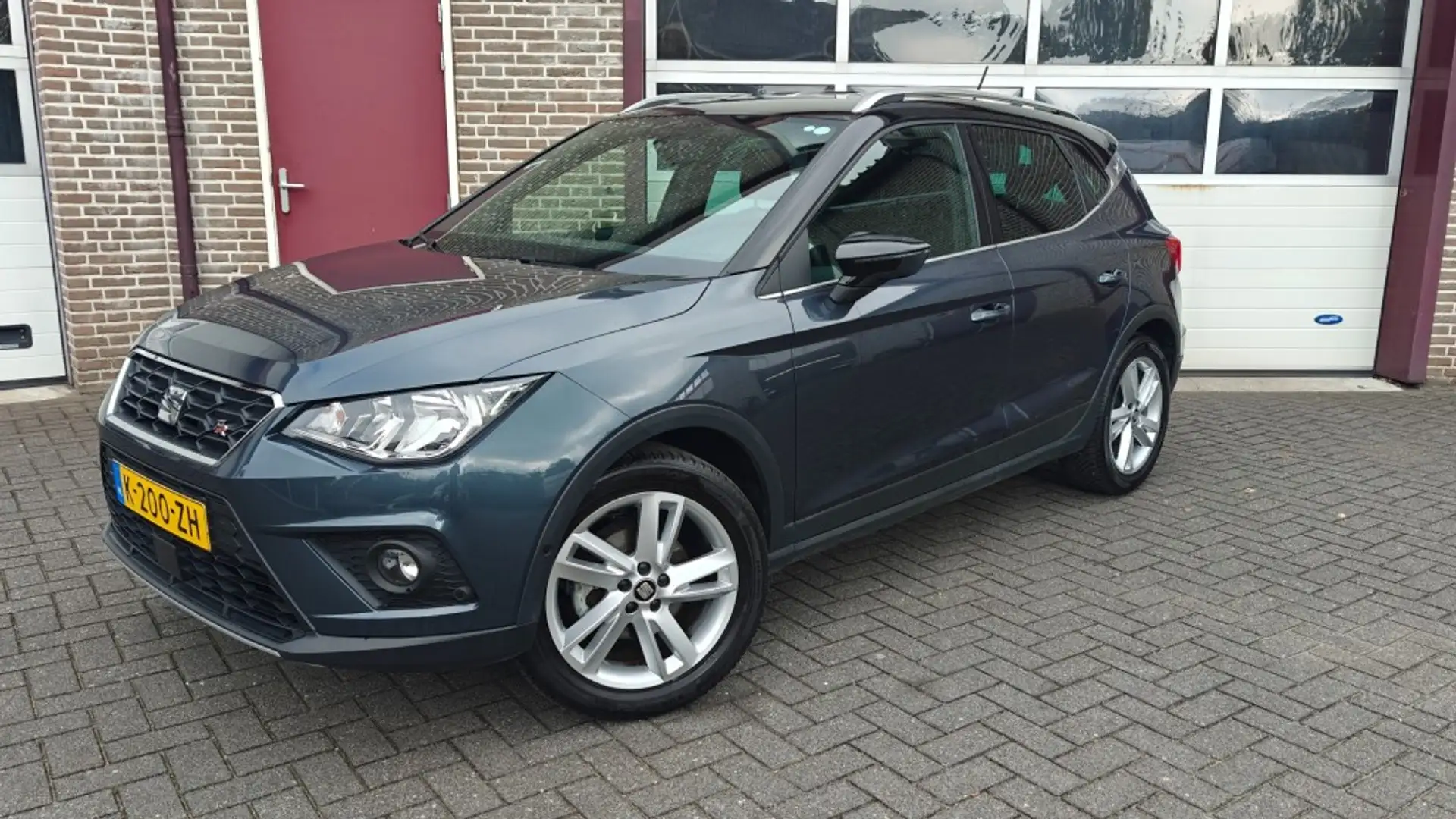 SEAT Arona 1.0 TSI 95PK FR BUSINESS INTENSE - All Season band Grigio - 1