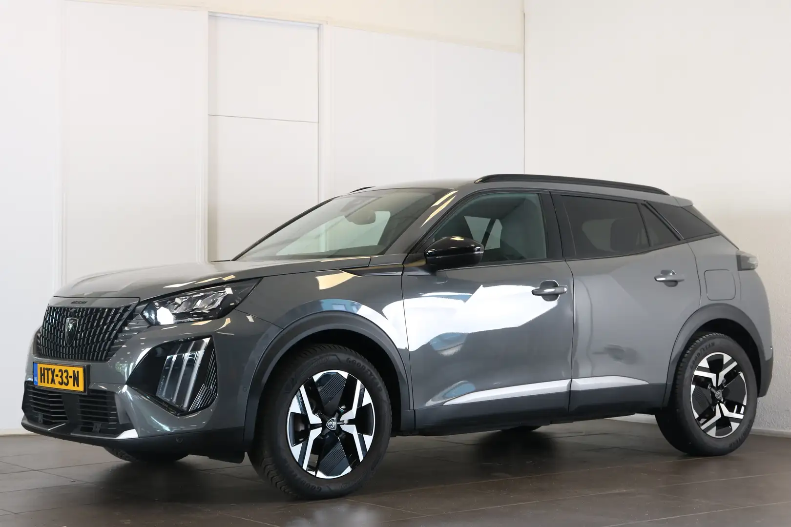 Peugeot 2008 1.2 PureTech Allure 130PK EAT8 | Navi | Clima | Ad Grijs - 1