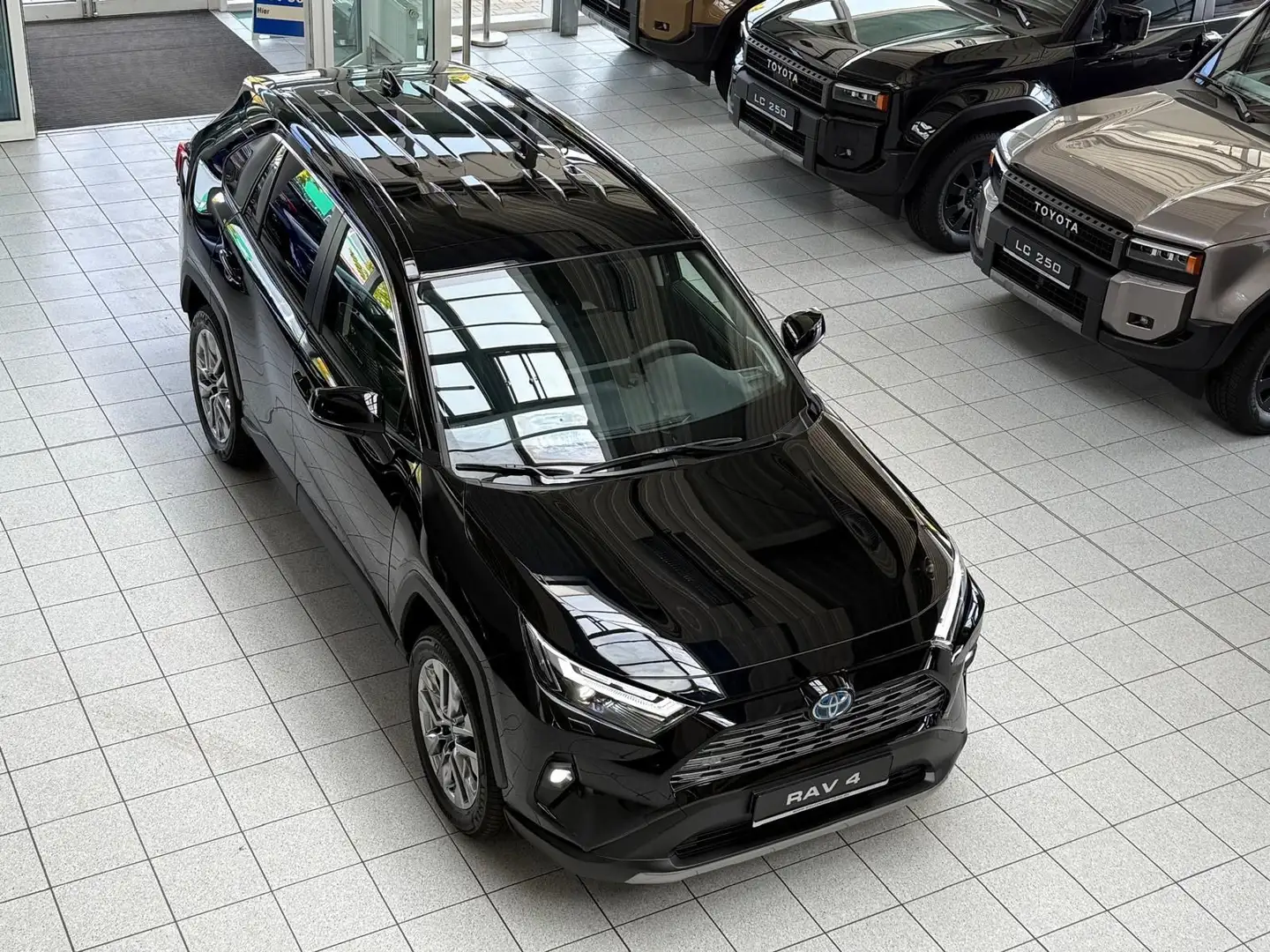 Toyota RAV 4 LOUNGE-4x2-JBL-360 KAMERA-Hybrid-37.790,- Schwarz - 2