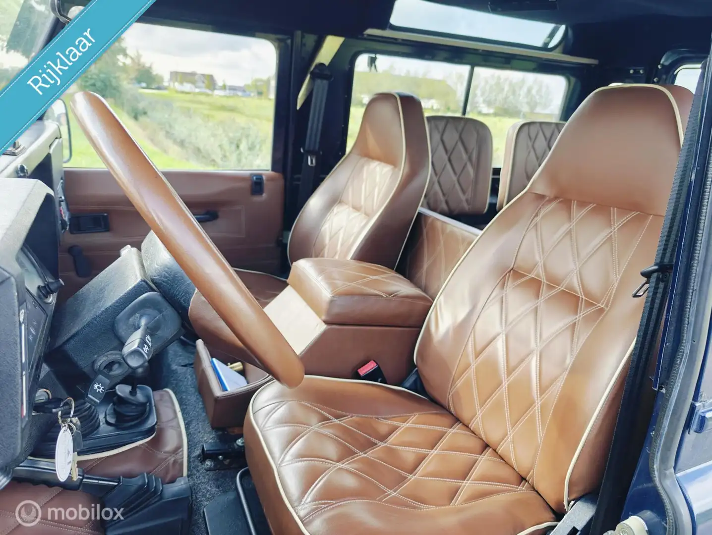 Land Rover Defender 90 HT 2.0 16v 136pk 6 persoons Синій - 2