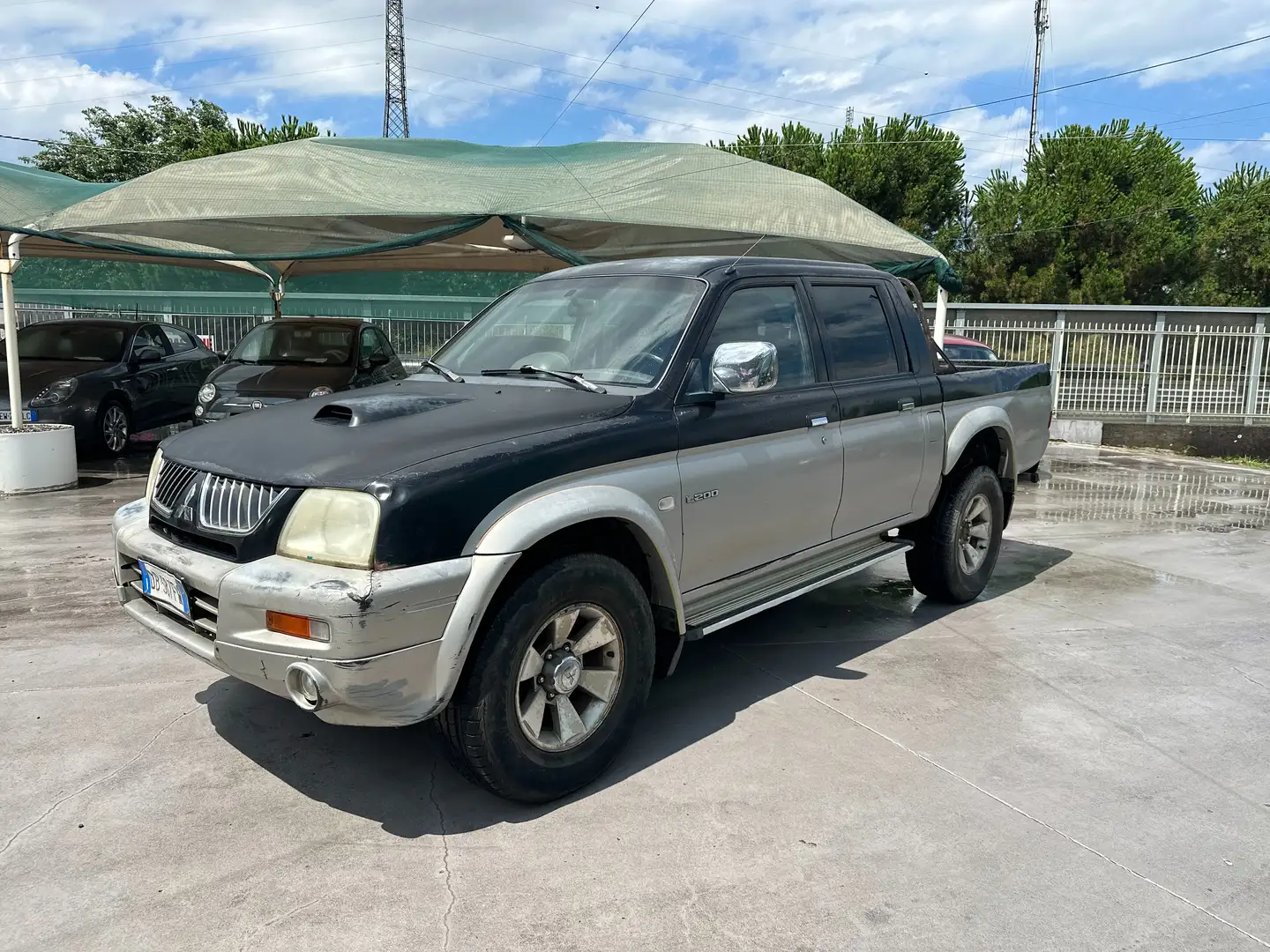 Mitsubishi L200 L200 Cab III d.cab 2.5 tdi Instyle Air 4wd Nero - 1