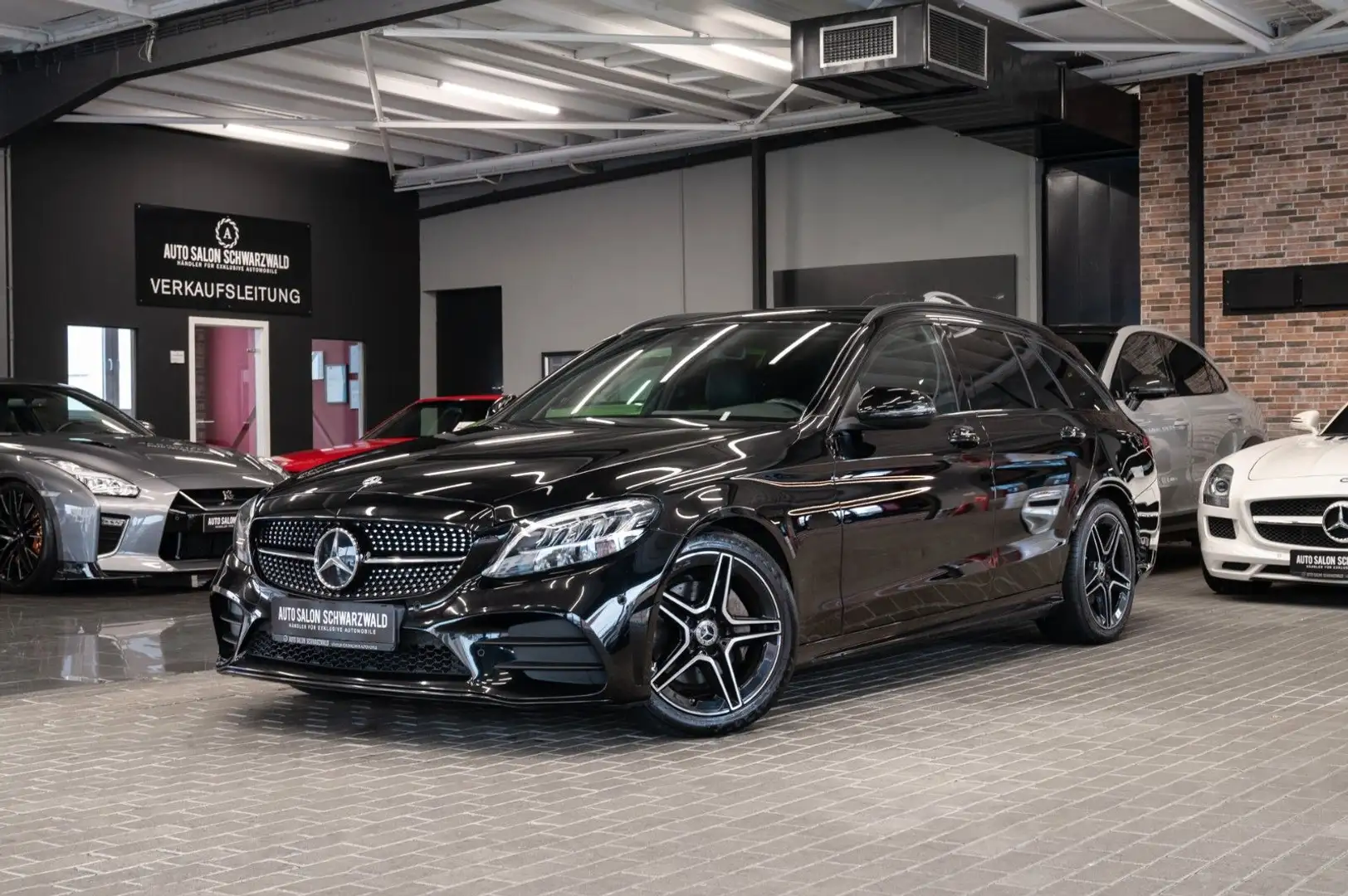 Mercedes-Benz C 220 C220d T|AMG-LINE|NIGHT-PAKET|AHK|NAVI|LED Schwarz - 1