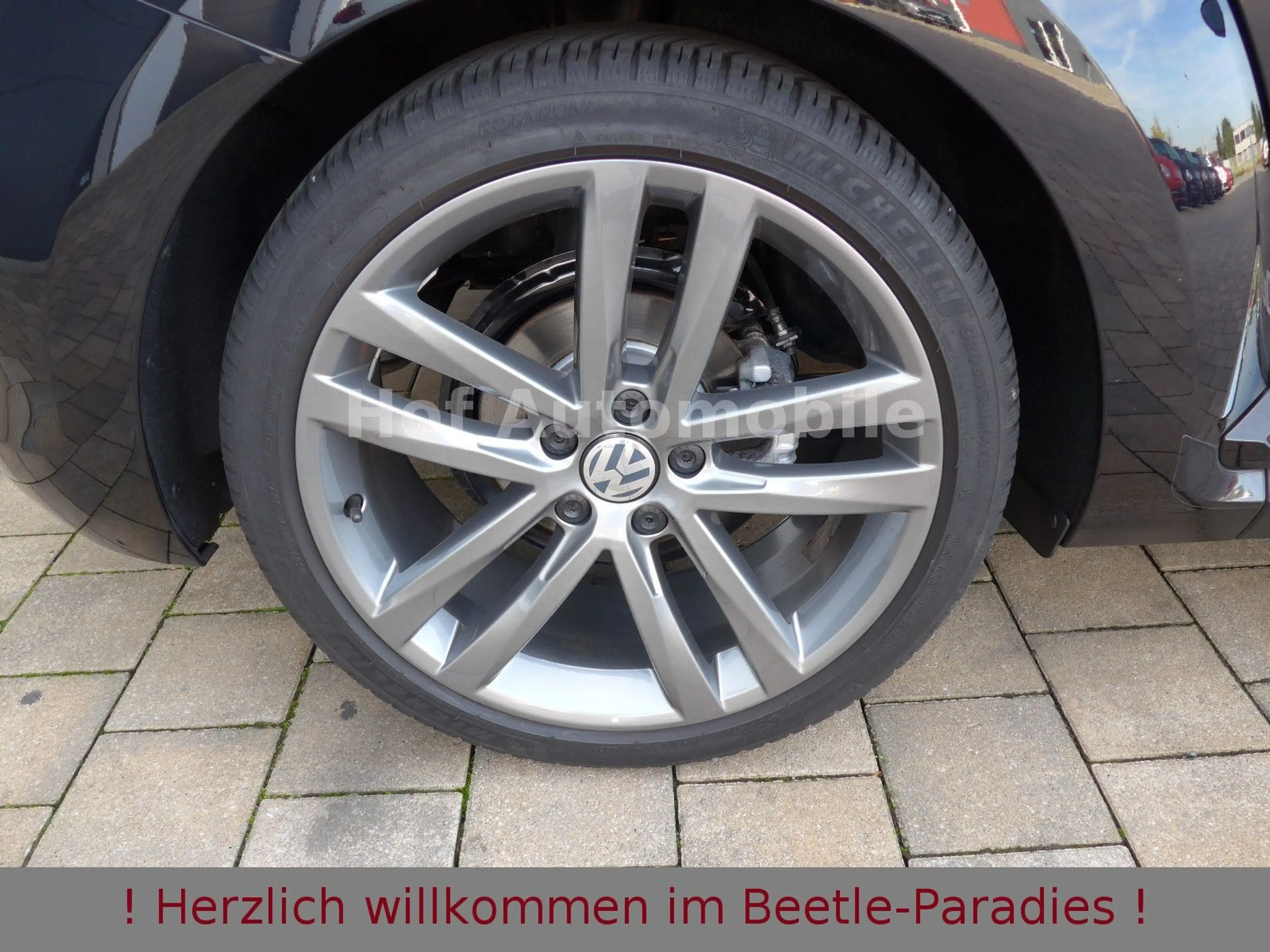 Volkswagen Beetle 1.4TSI DSG DENIM Fender Navi Allwetter — photo 10
