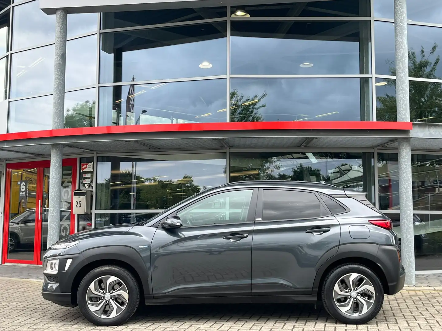 Hyundai KONA 1.6 GDI HEV Comfort | Navigatie | Trekhaak | Camer Gris - 2