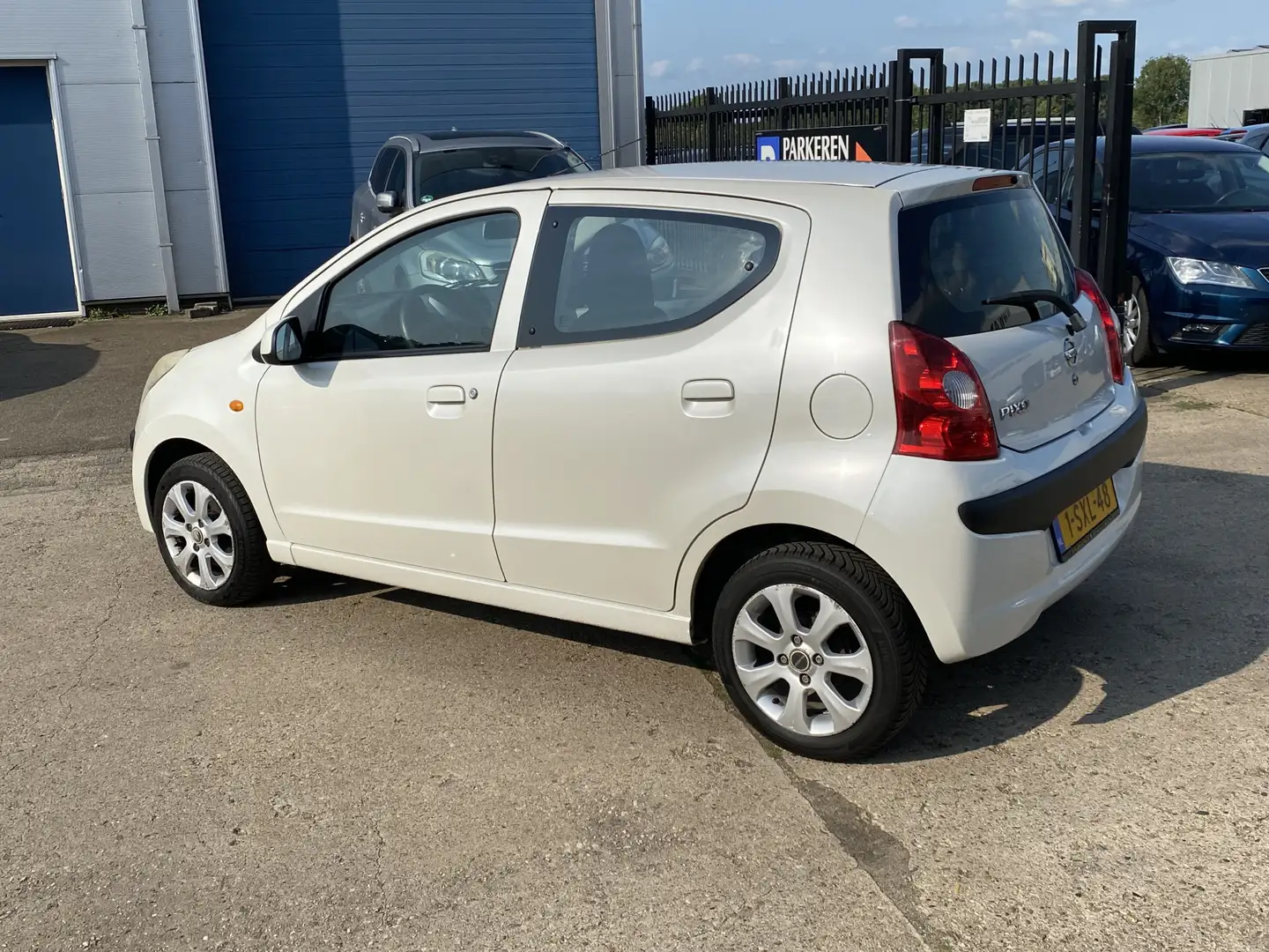 Nissan Pixo 1.0 Acenta 5-DEURS, PARELMOER WIT, APK TOT 01-08-2 Blanc - 2