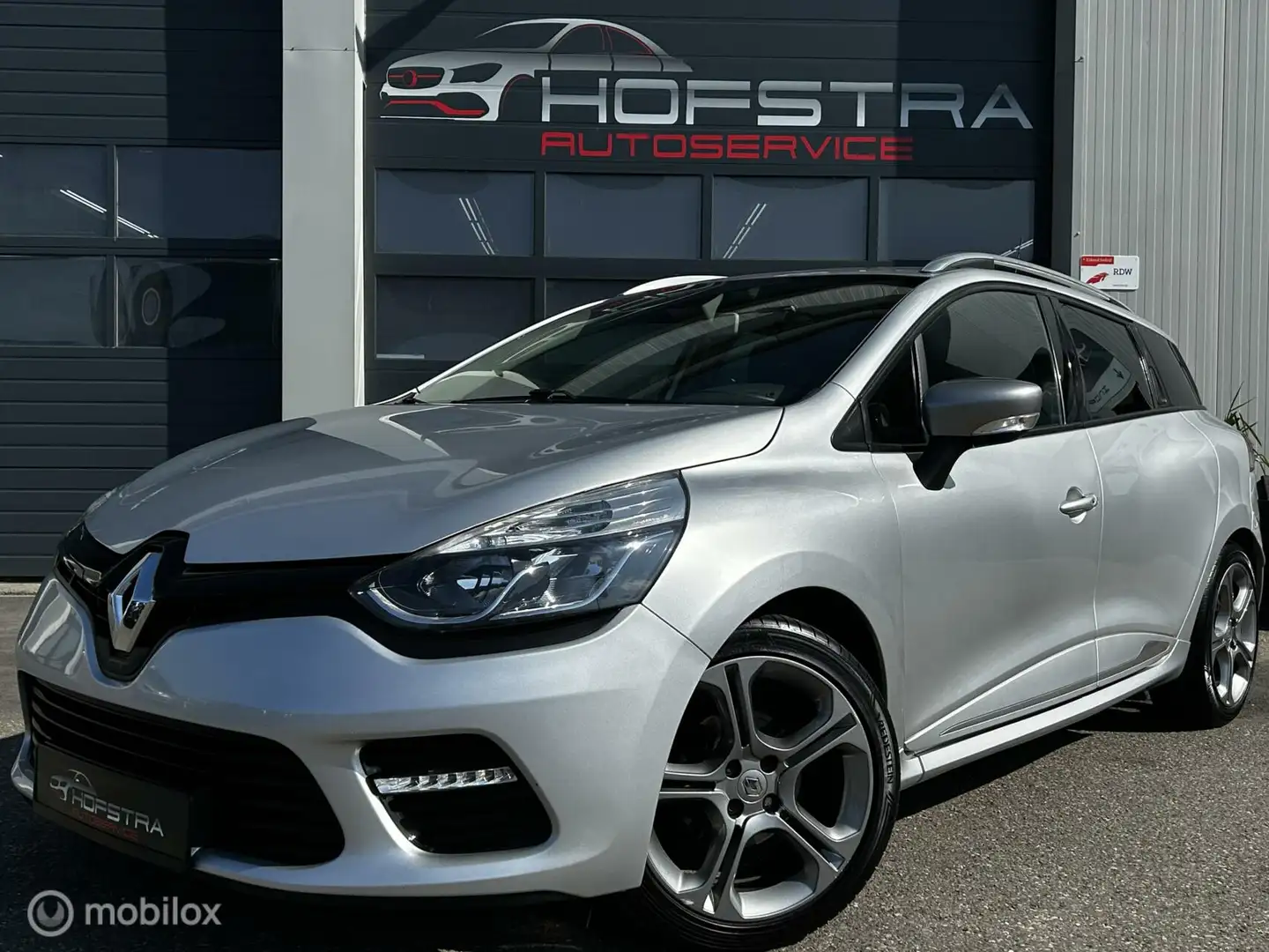 Renault Clio Estate 1.2 GT Sport Aut. 120pk Navi PDC uniek! Grijs - 1