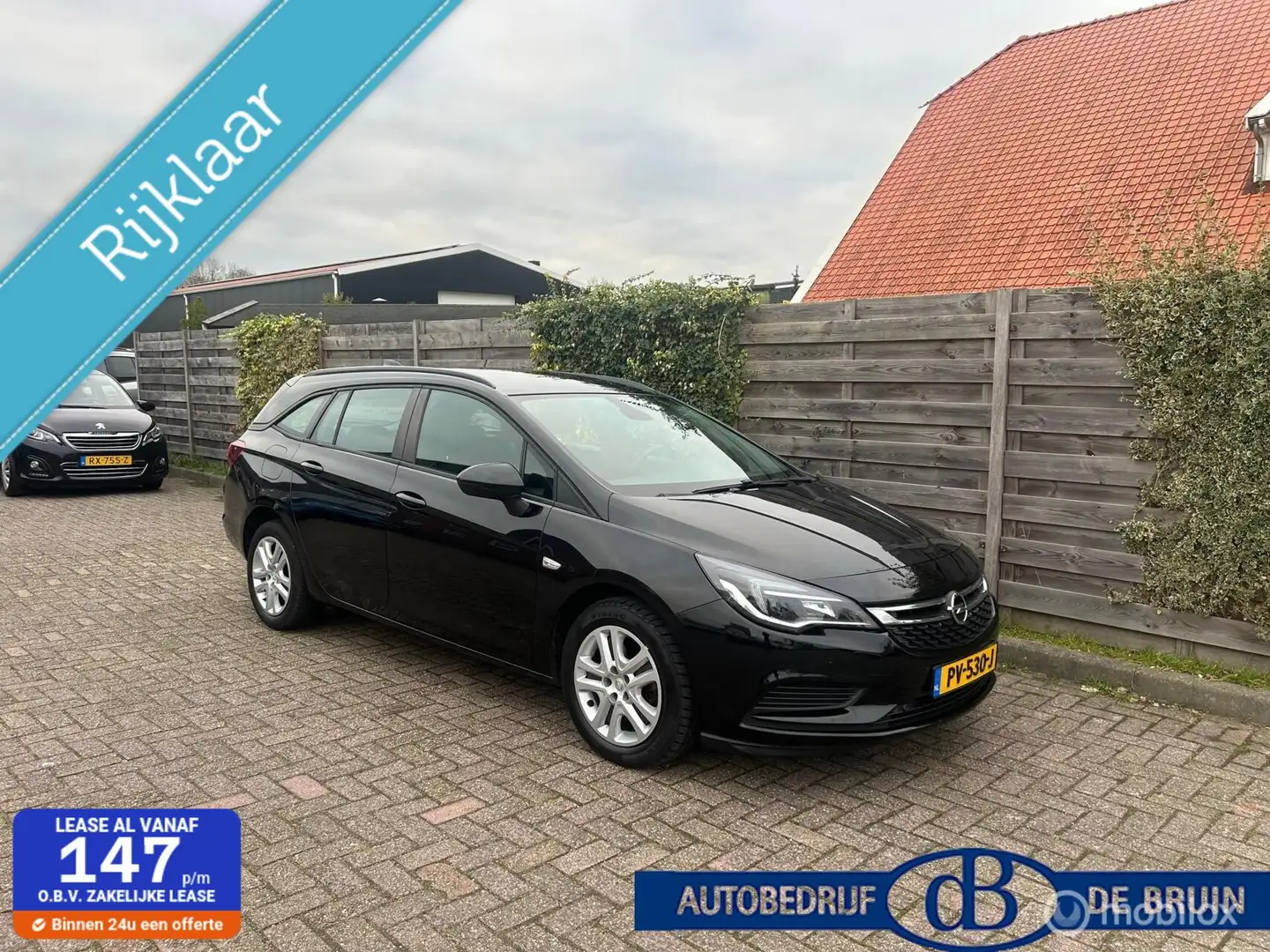 Opel Astra Sports Tourer 1.0 Online Edition Navigatie Trekhaa Zwart - 1