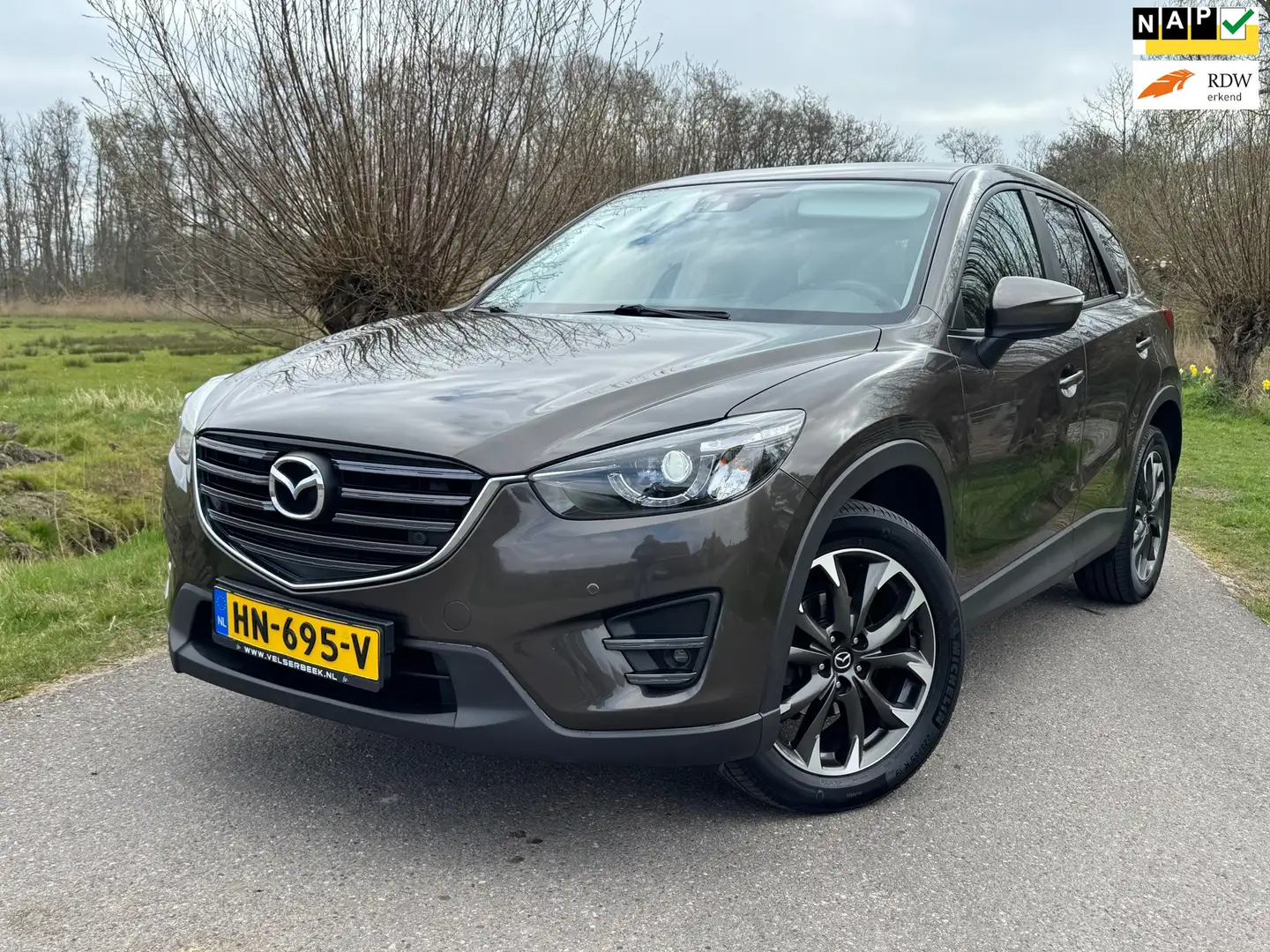 Mazda CX-5 2.0 SkyActiv-G 160 GT-M 4WD Airco / Navigatie / 1s Bruin - 1