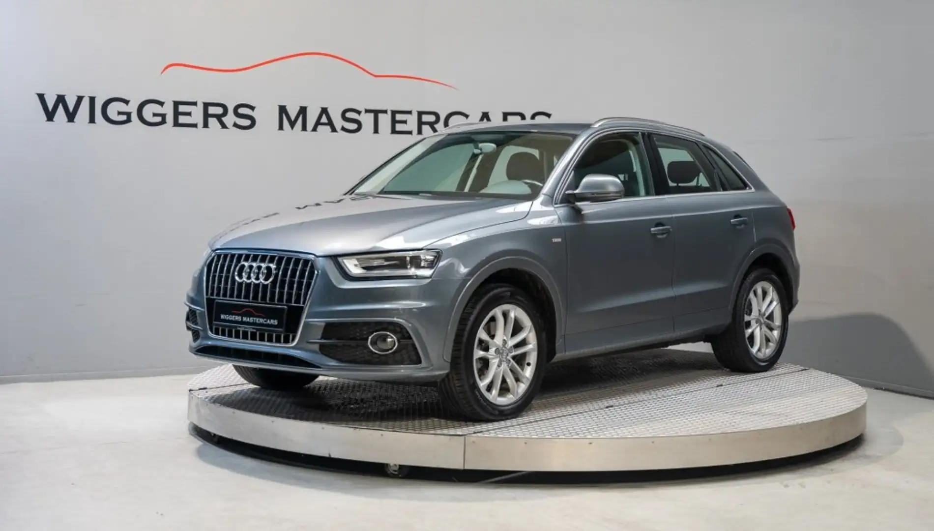Audi Q3 1.4 TFSI S-Line, Trekhaak, 18 Inch LM velgen, Airc Grijs - 1