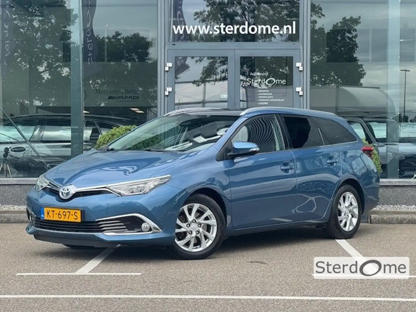 Toyota Auris Touring Sports 1.8 Hybrid Lease pro | Panoramadak Blauw - 1