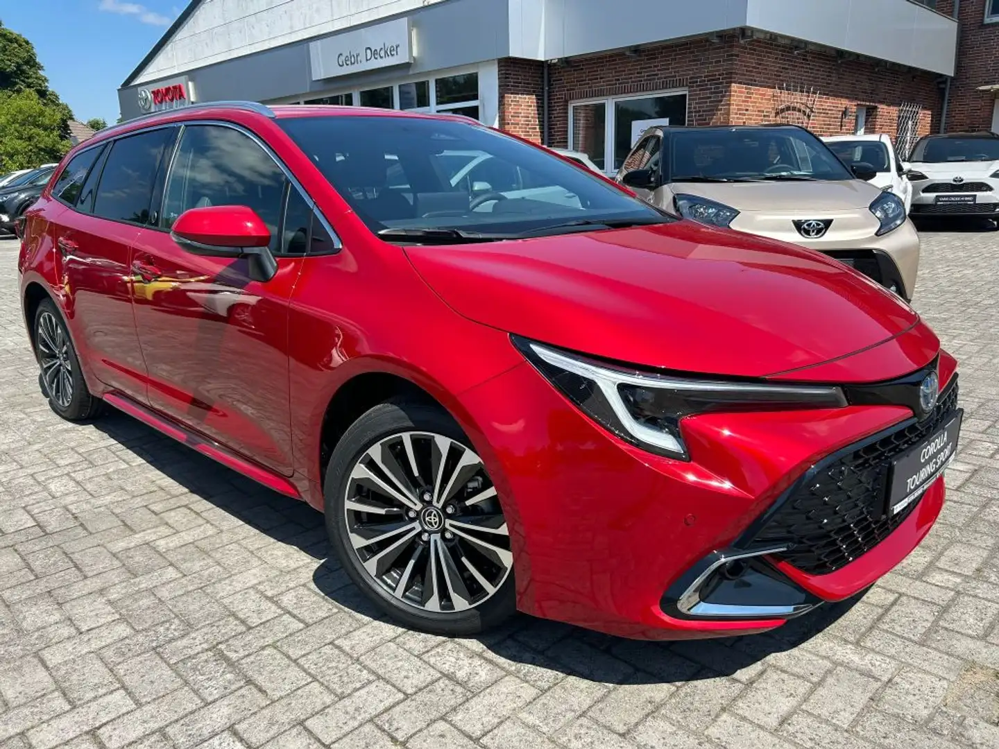 Toyota Corolla 2.0 Hybrid Touring Sports Teamplayer (ZE1HE) Rouge - 1