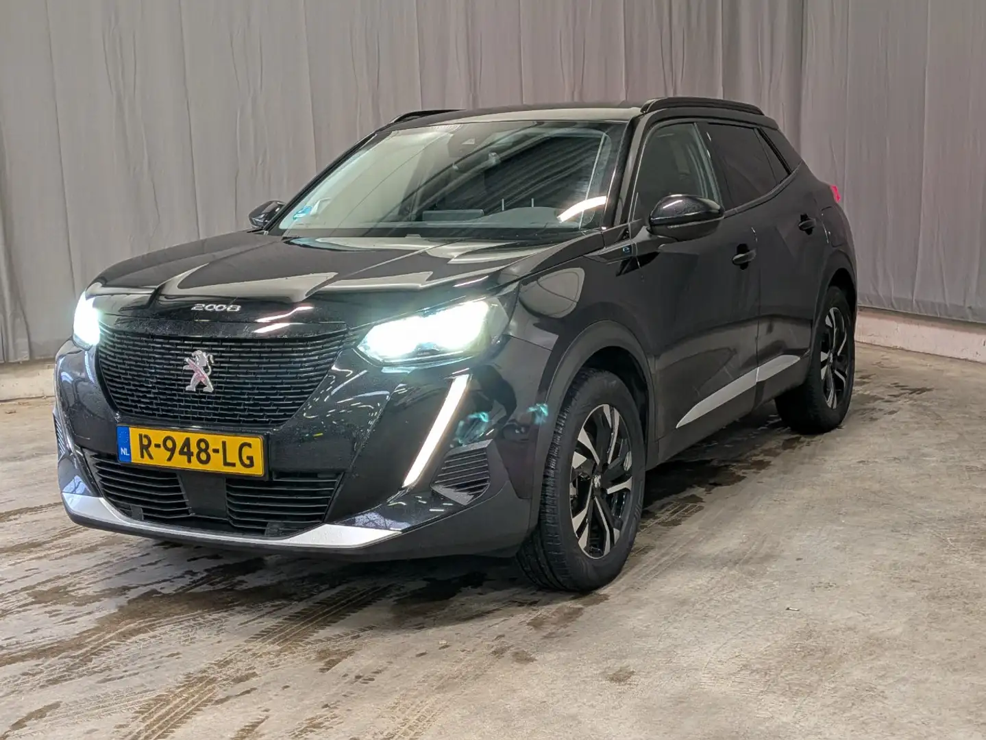 Peugeot e-2008 EV Allure Pack 50 kWh 3 Fase | Stoelverwarming | A Negro - 1